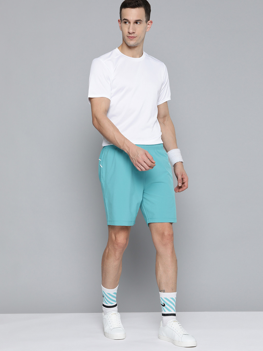 

HRX By Hrithik Roshan Racketsport Men Peacock Blue Rapid-Dry Brand Carrier Shorts