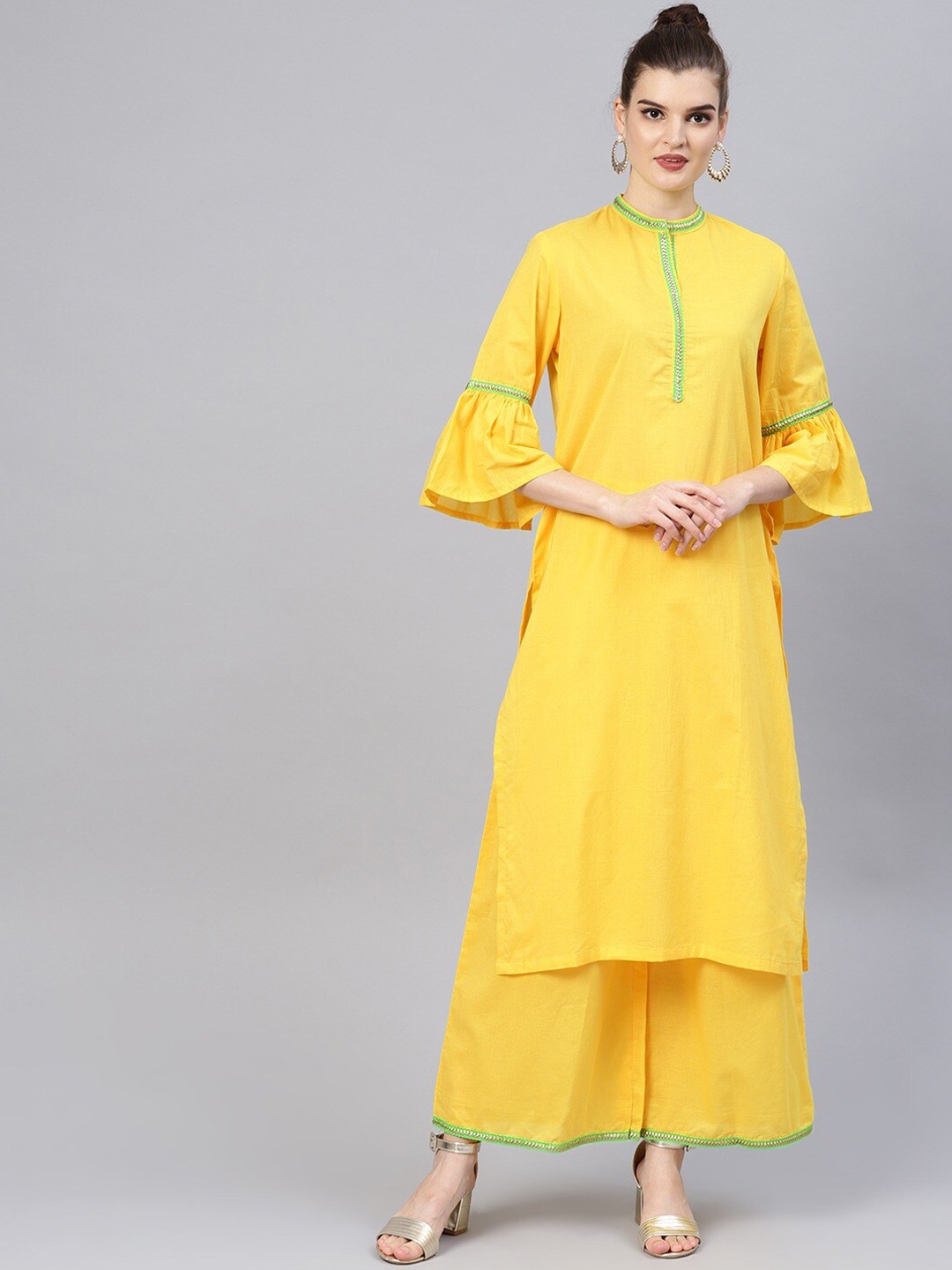 

Tulsattva Women Yellow Pure Cotton Kurta with Palazzos