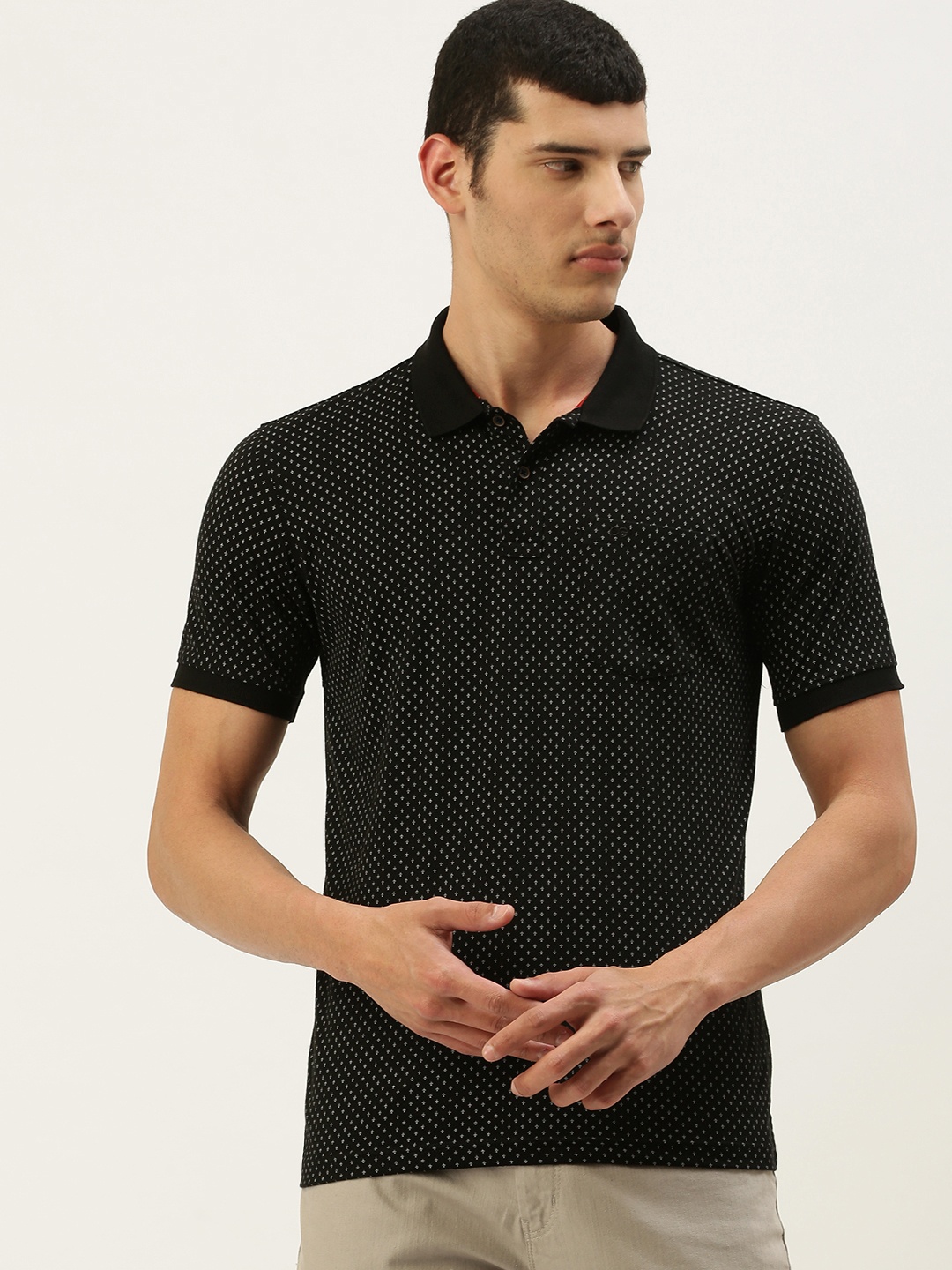 

Peter England Men Black & Off White Printed Polo Collar T-shirt
