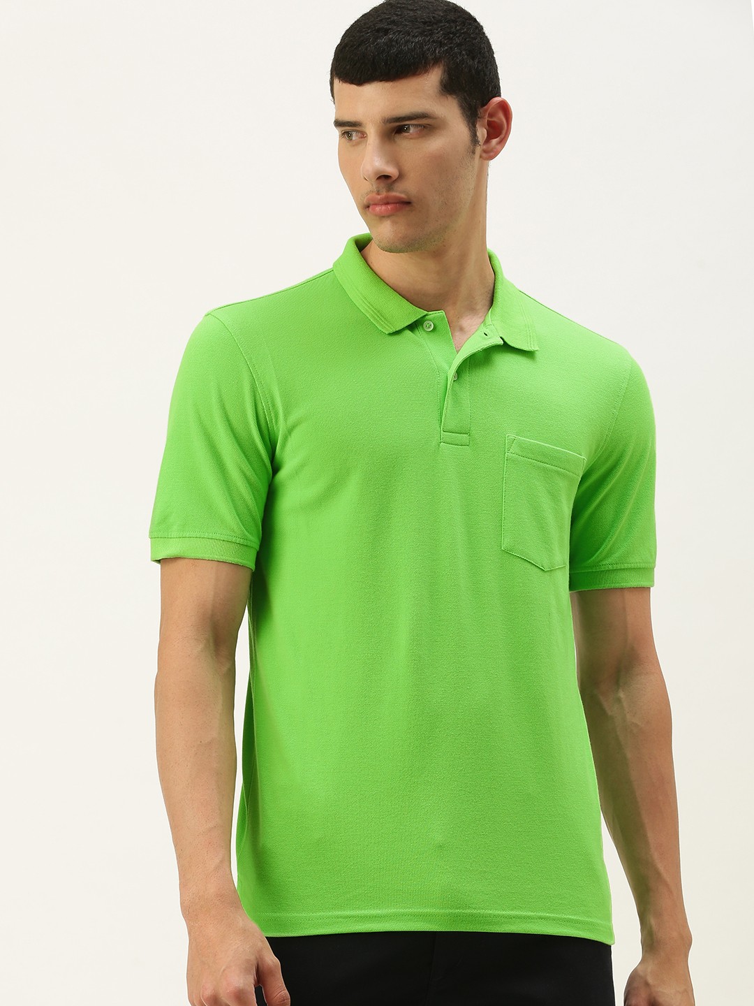 

Peter England Men Green Solid Polo Collar T-shirt