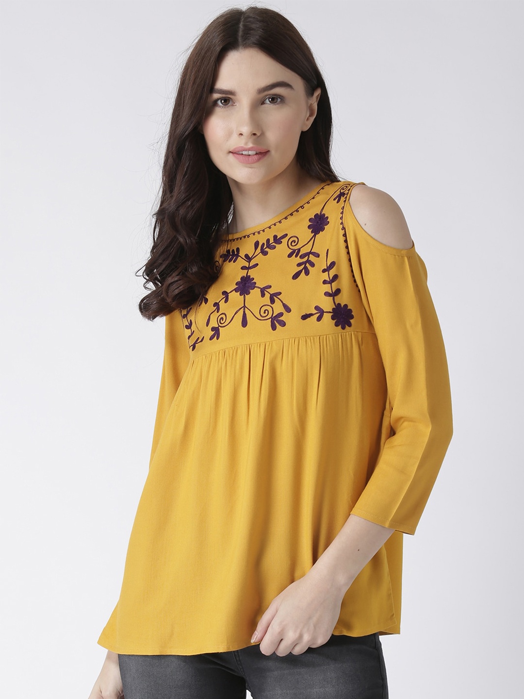 

The Vanca Yellow Floral Embellished Top