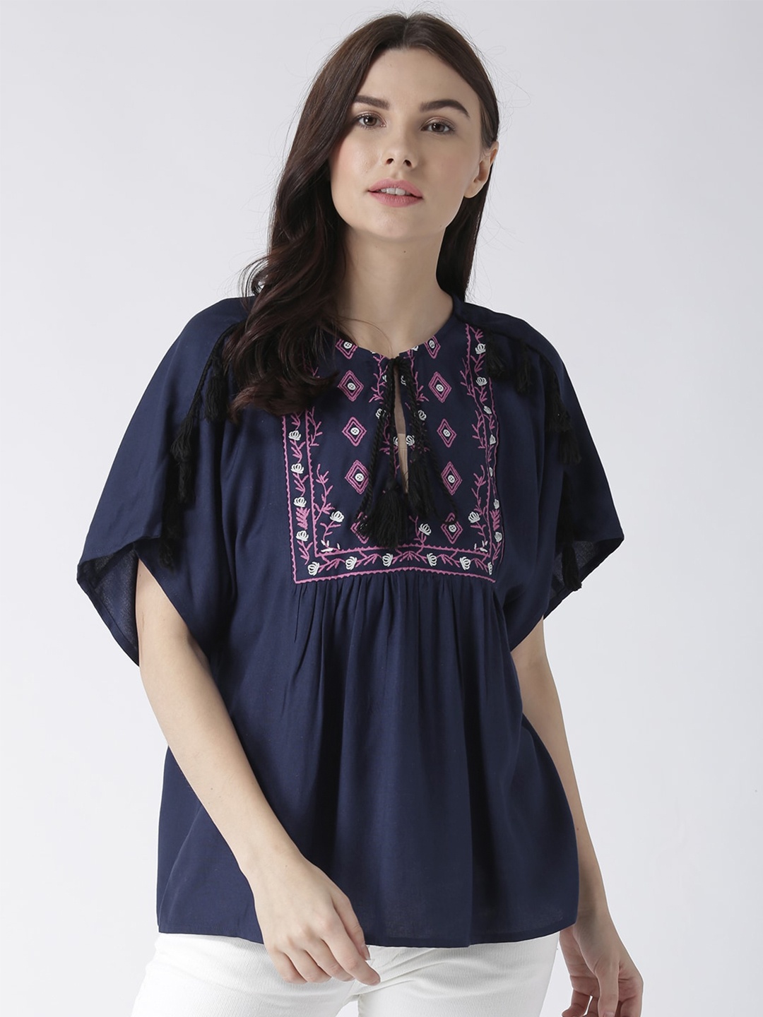 

The Vanca Blue Floral Embroidered Tie-Up Neck Extended Sleeves Top