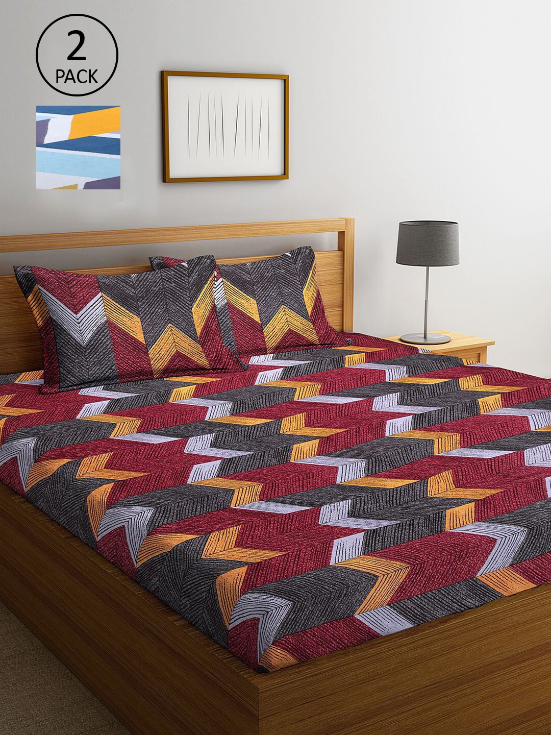 

KLOTTHE Maroon & Yellow Geometric 210 TC 2 King Bedsheet with 4 Pillow Covers