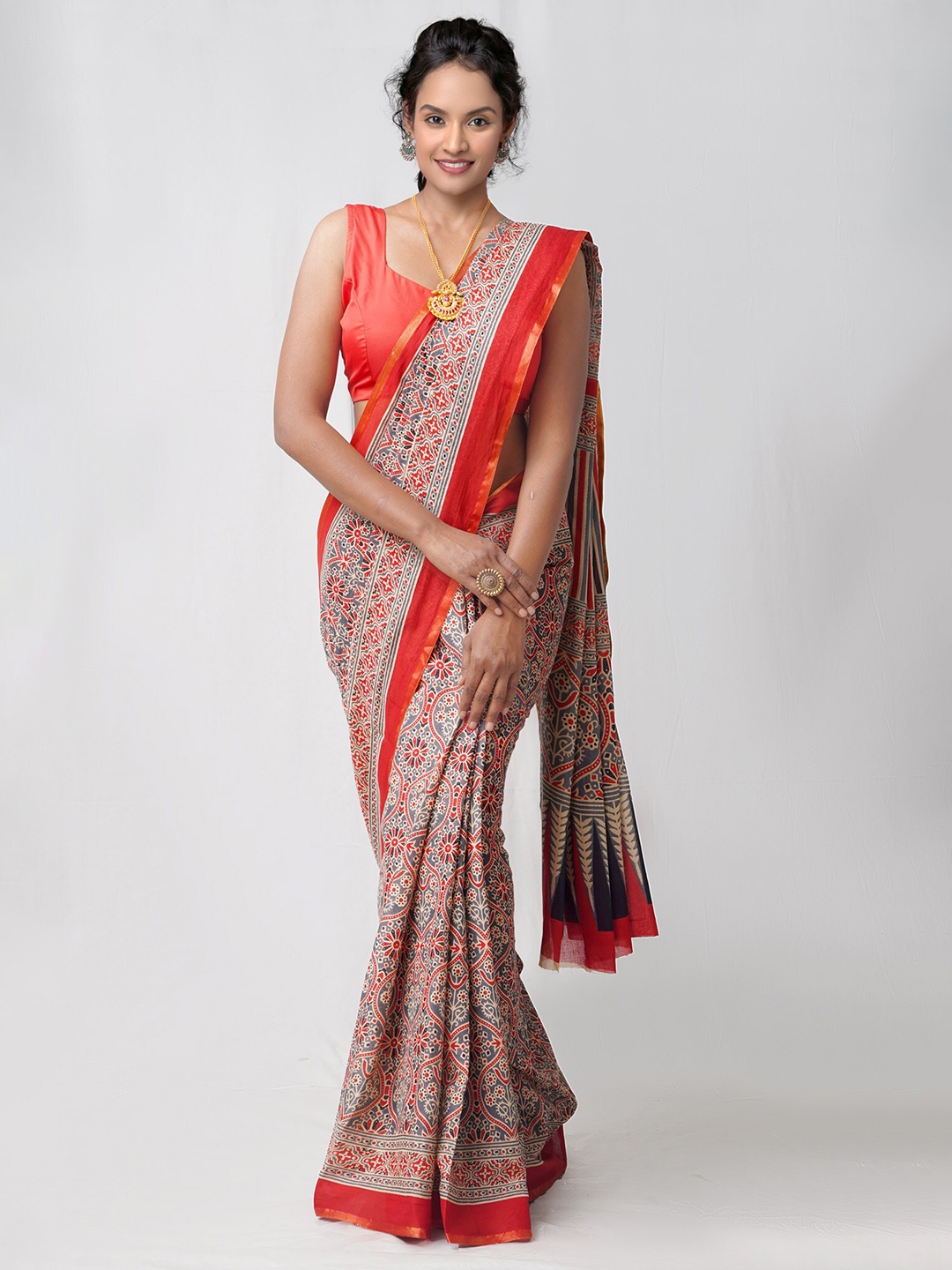 

Unnati Silks Orange & Gold-Toned Zari Pure Cotton Bhagalpuri Saree