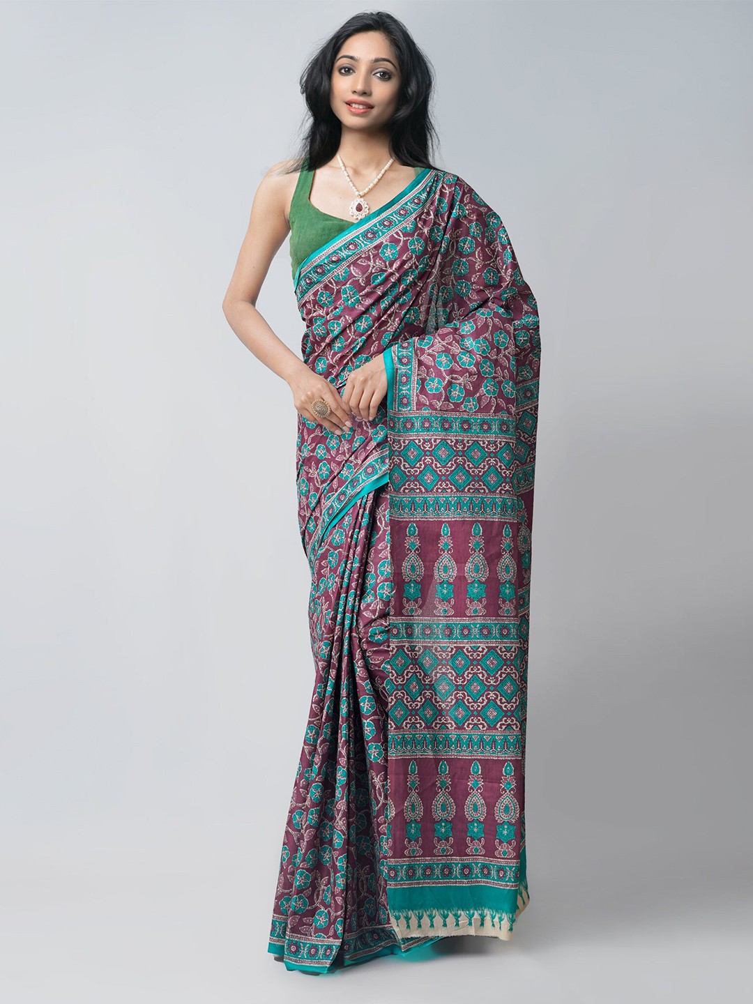 

Unnati Silks Burgundy & Blue Floral Pure Cotton Kovai Saree