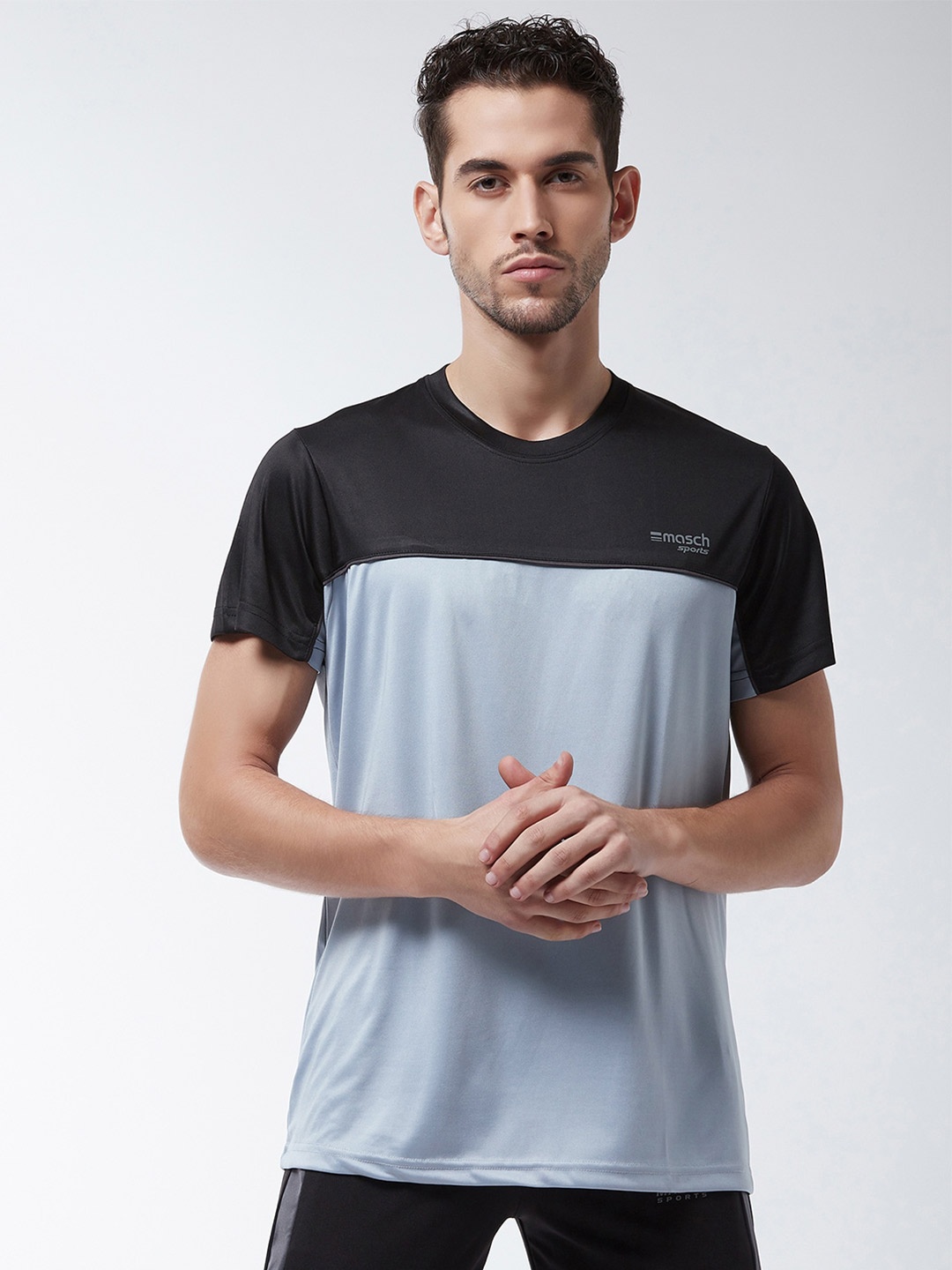 

Masch Sports Men Grey & Black Colourblocked Sports T-shirt