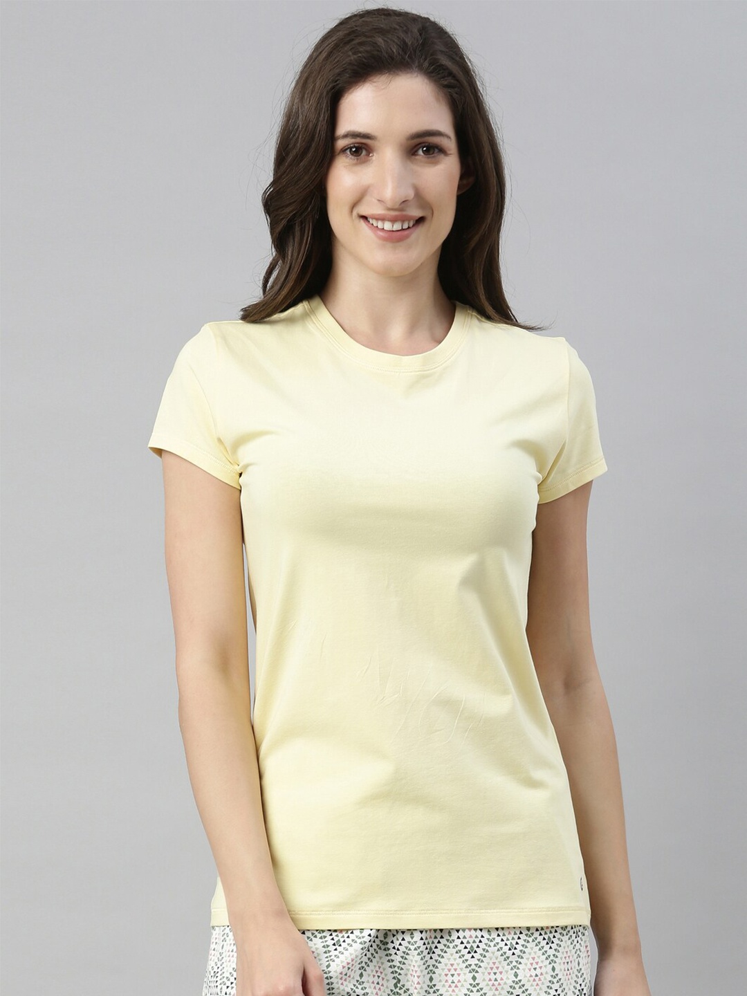 

Enamor Women Lemon Cream Solid Slim Fit Cotton T-shirt