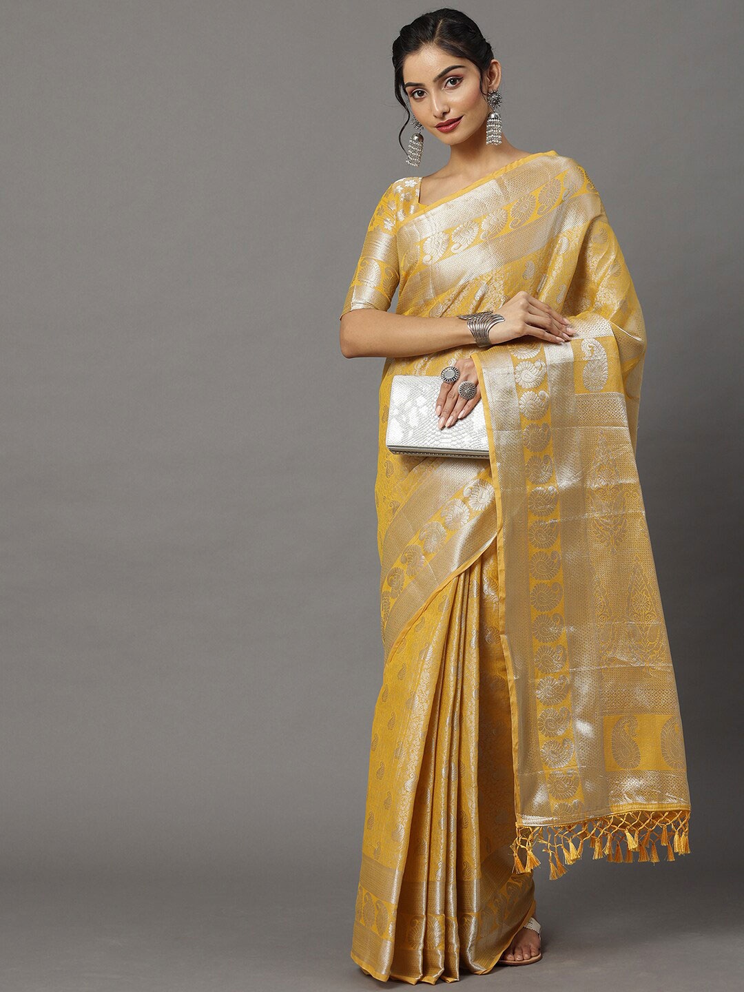 

Mitera Yellow & Gold-Toned Ethnic Motifs Zari Silk Blend Kanjeevaram Saree