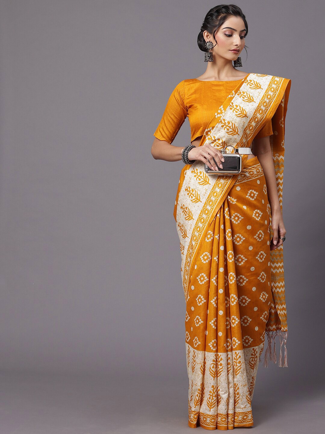 

Mitera Yellow & White Floral Printed Art Silk Bhagalpuri Saree
