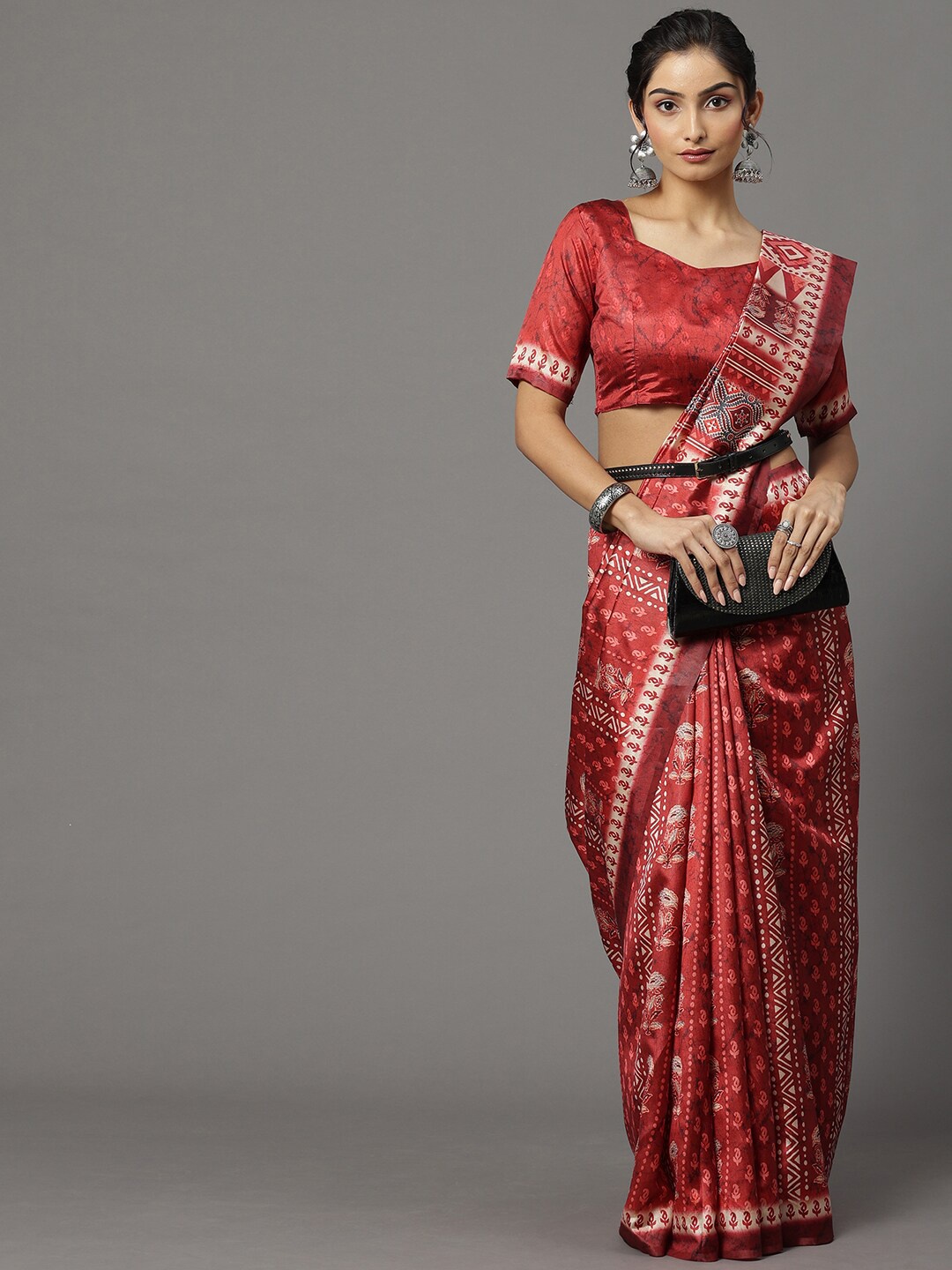 

Mitera Maroon & White Ethnic Motifs Silk Blend Ikat Saree