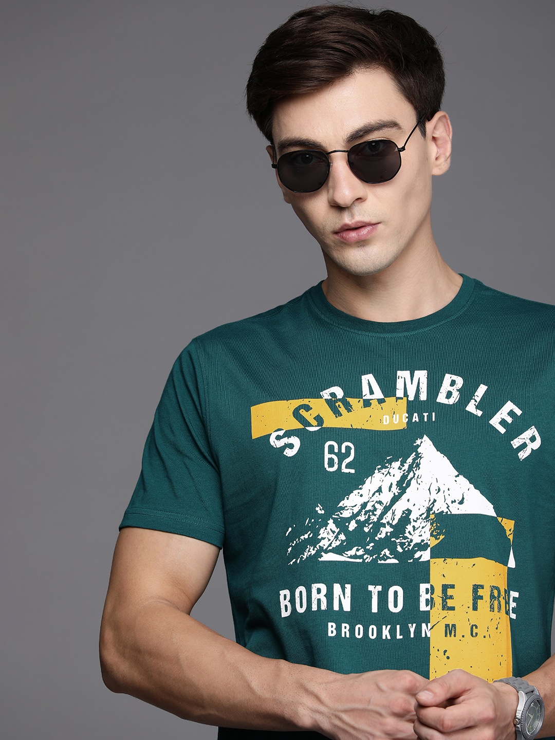 

Ducati Men Dark Green Graphic Printed Pure Cotton Casual T-shirt