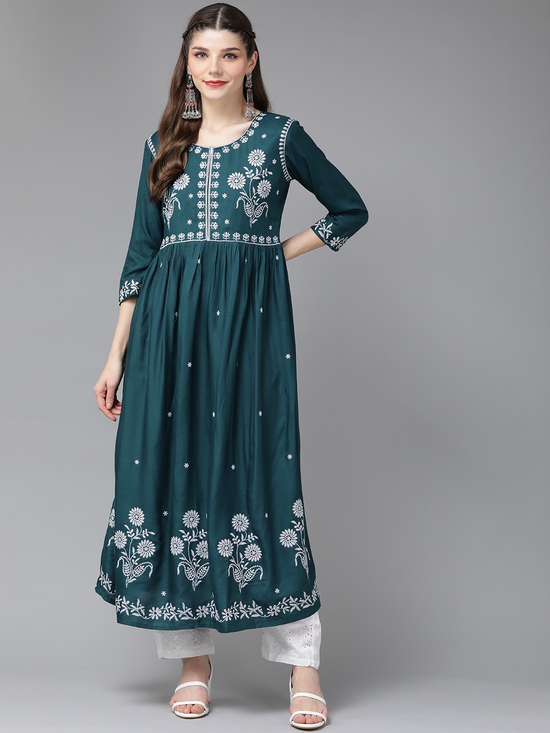 

Yufta Women Teal Blue & Silver Embroidered Empire Chikankari Kurta with Palazzos