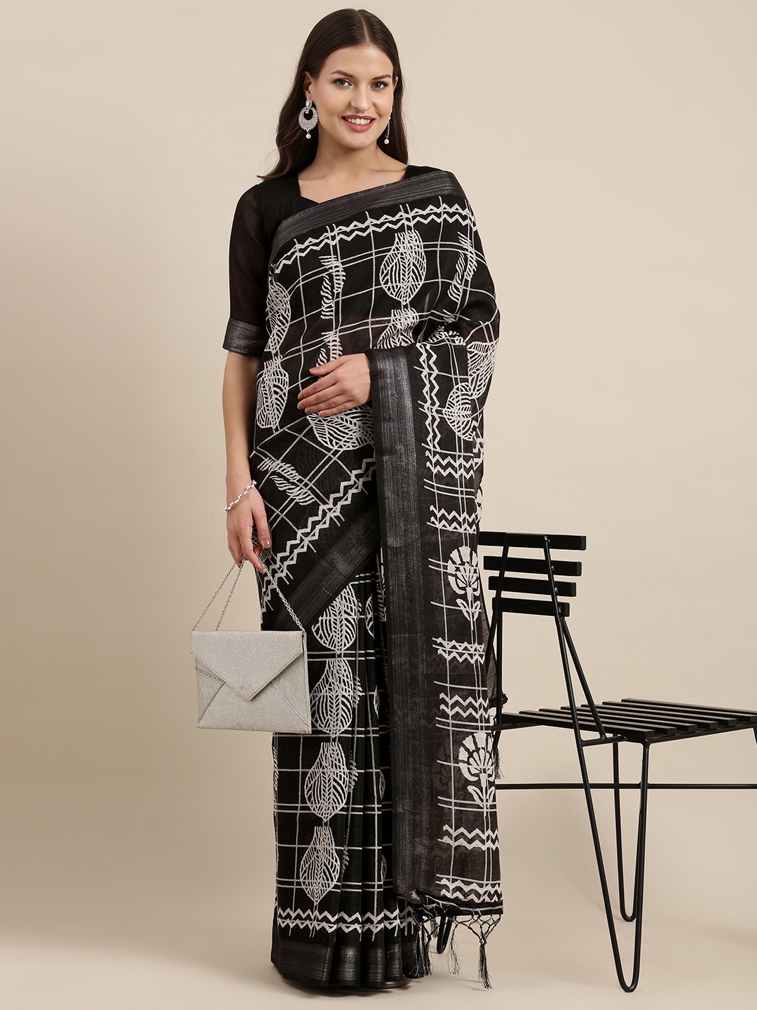 

Mitera Black & White Ethnic Motifs Zari Linen Blend Bagh Saree