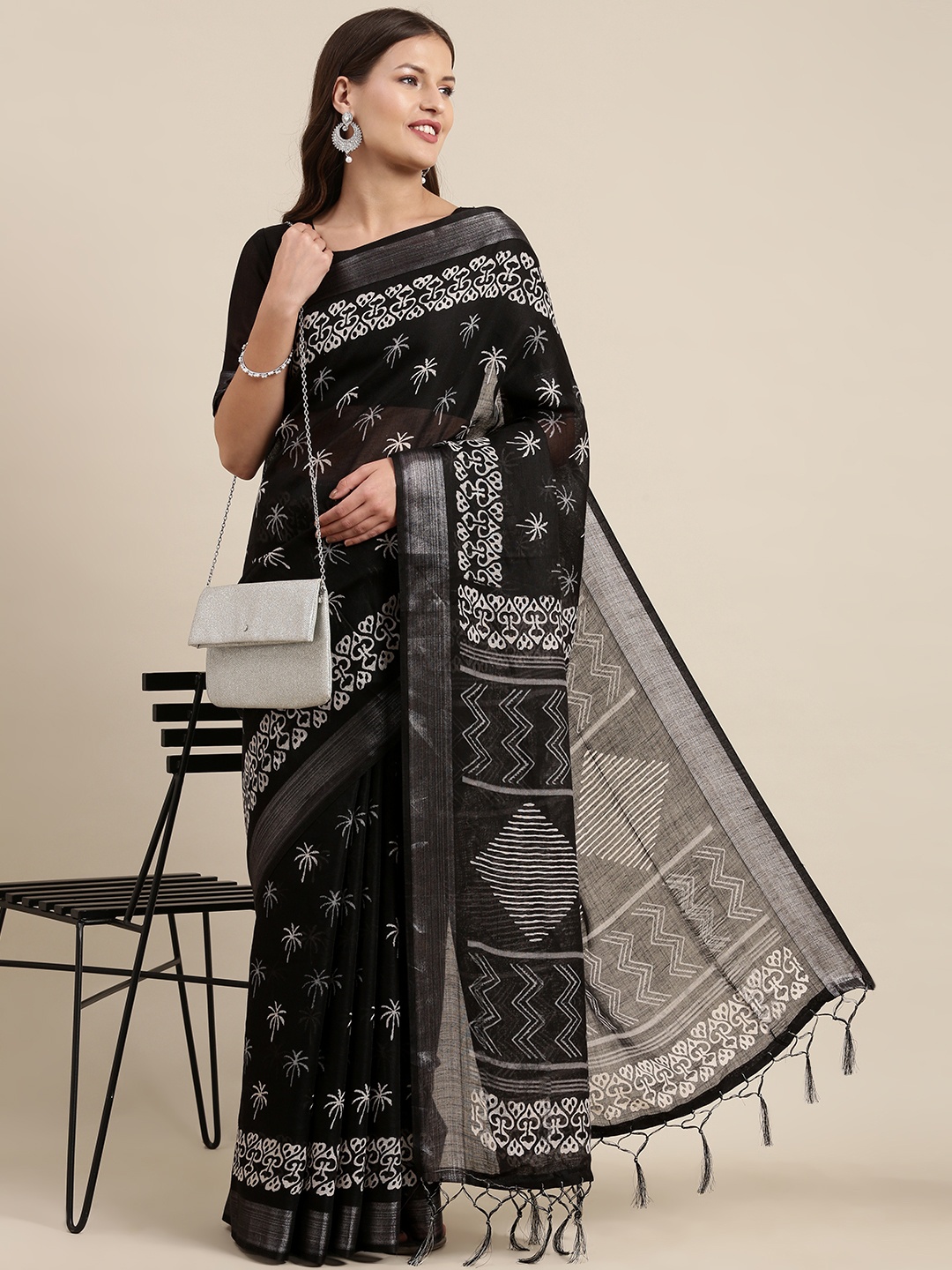 

Mitera Black & White Ethnic Motifs Zari Linen Blend Bagh Saree