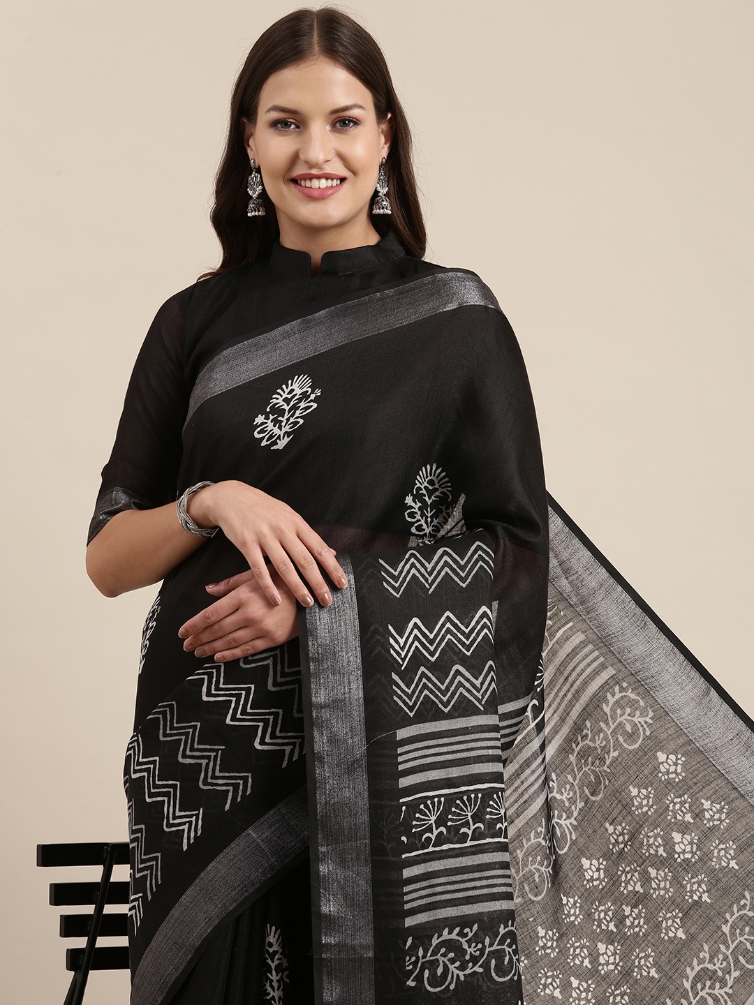 

Mitera Black & Grey Ethnic Motifs Zari Linen Blend Bagh Saree