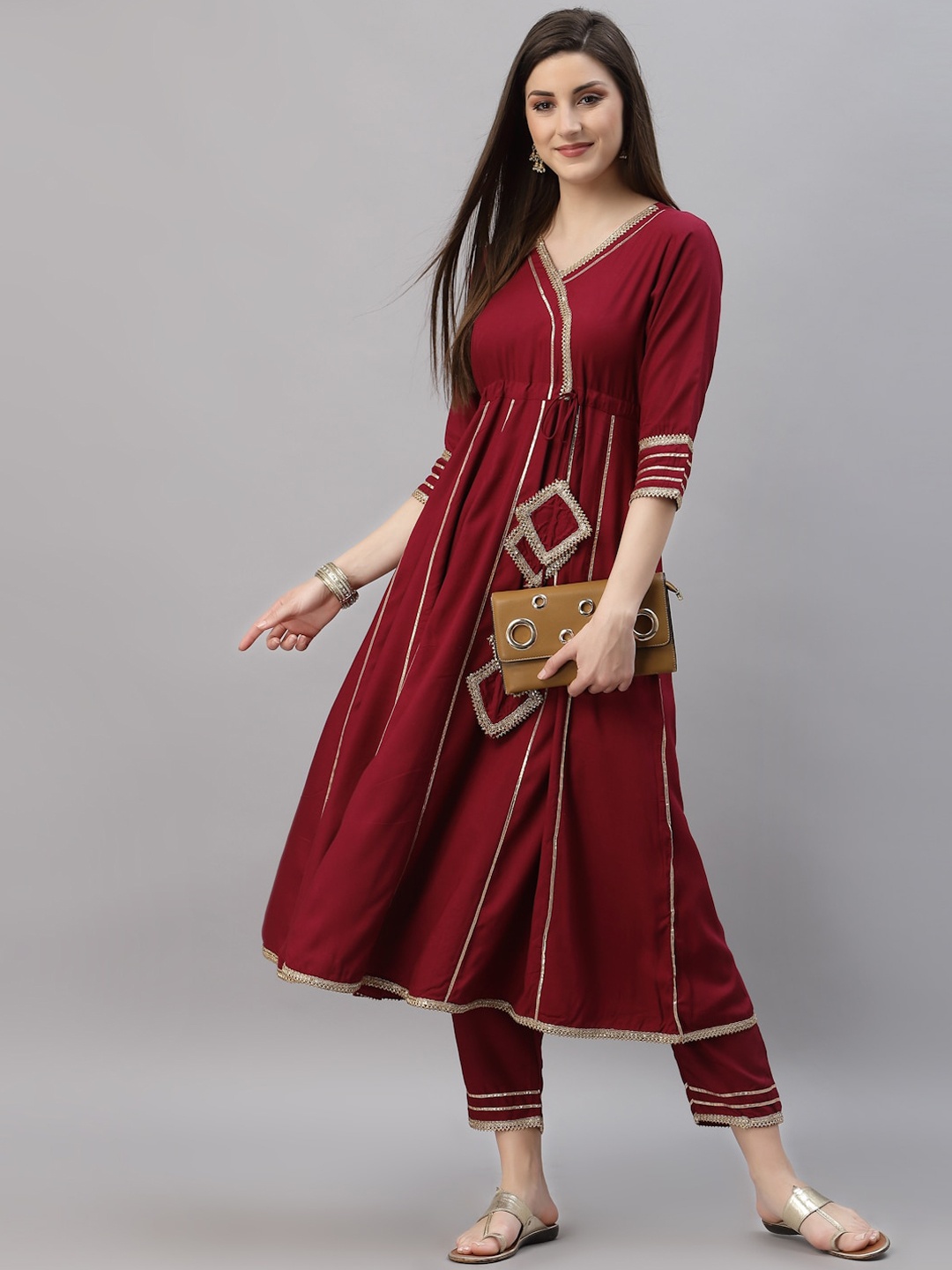 

Rudra Bazaar Women Maroon & Golden Angrakha Gotta Patti Kurta with Trousers