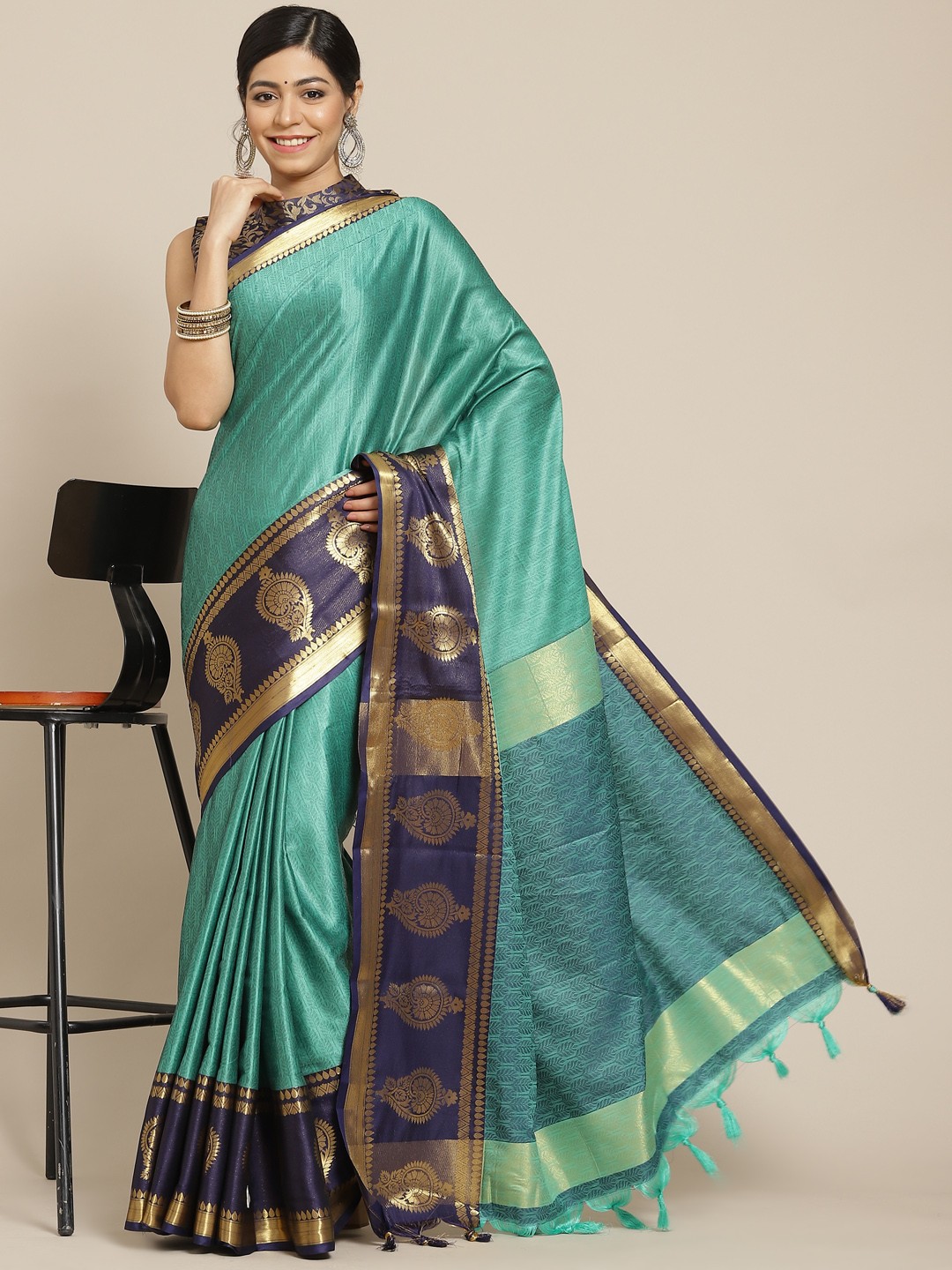 

Mitera Turquoise Blue Woven Design Silk Cotton Kanjeevaram Saree