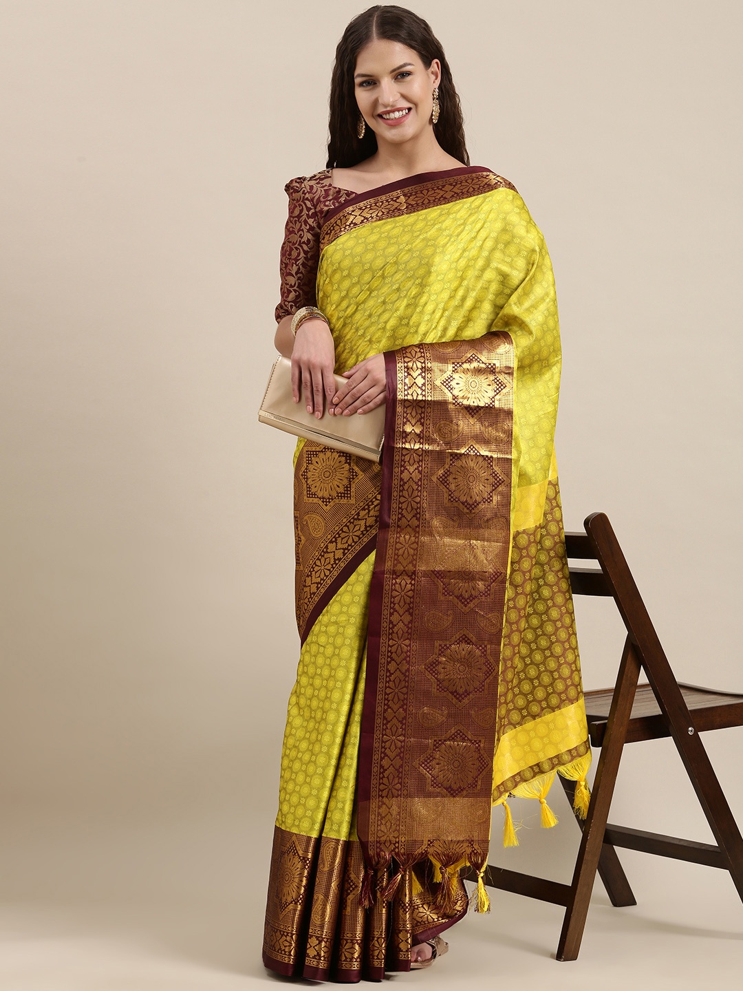 

Satrani Green & Brown Ethnic Motifs Woven Design Silk Cotton Banarasi Saree