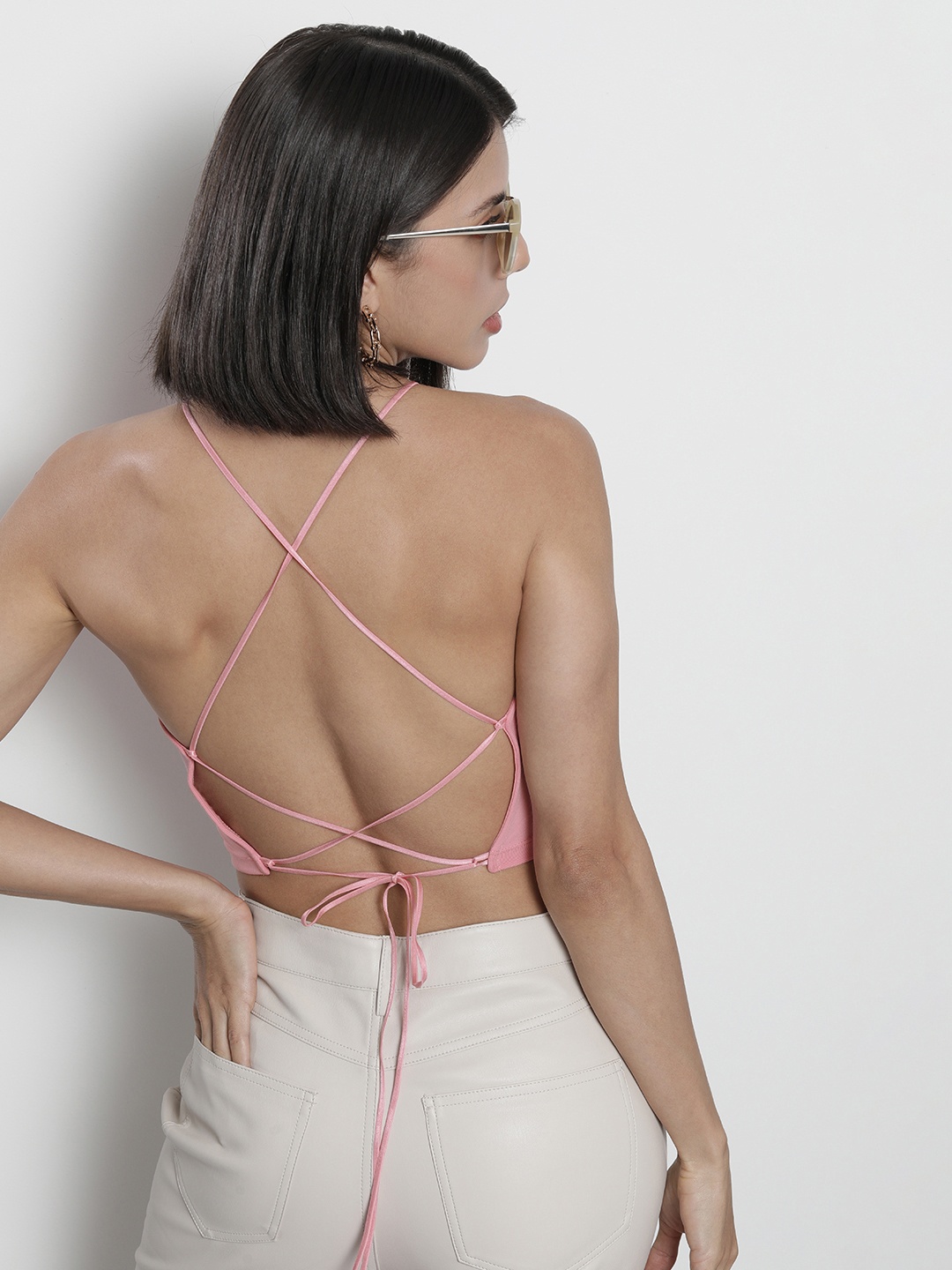 

Tommy Hilfiger Pink Solid Halter Neck Styled Back Crop Top