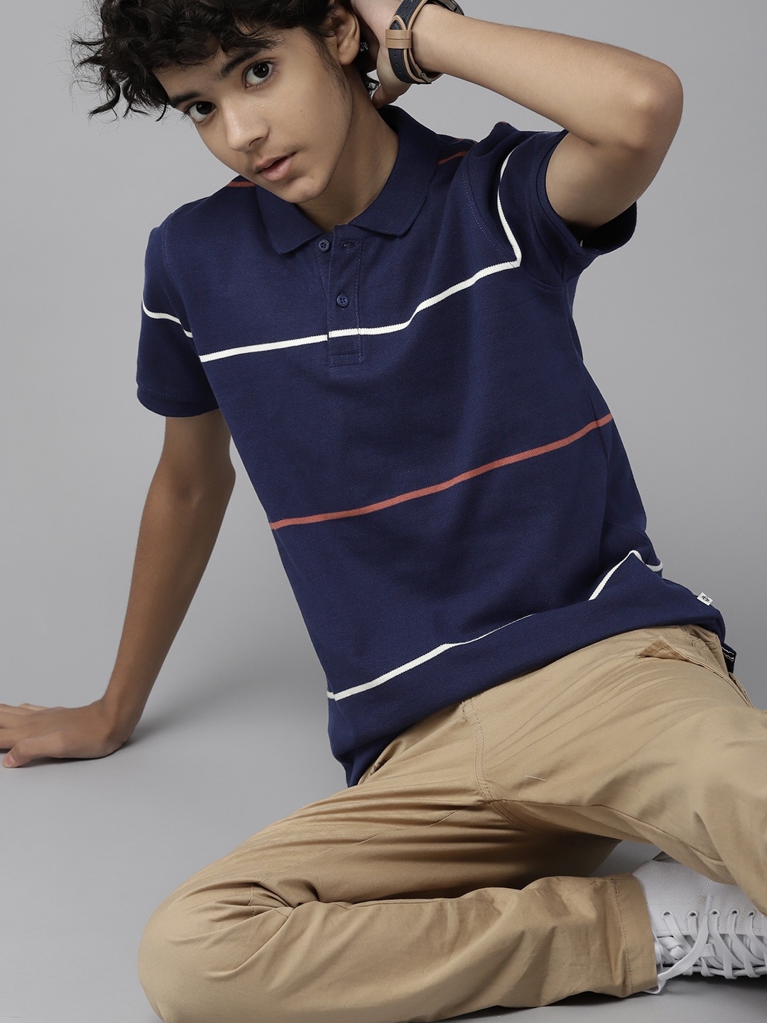 

UTH by Roadster Boys Navy Blue & Off White Striped Polo Collar Pure Cotton T-shirt