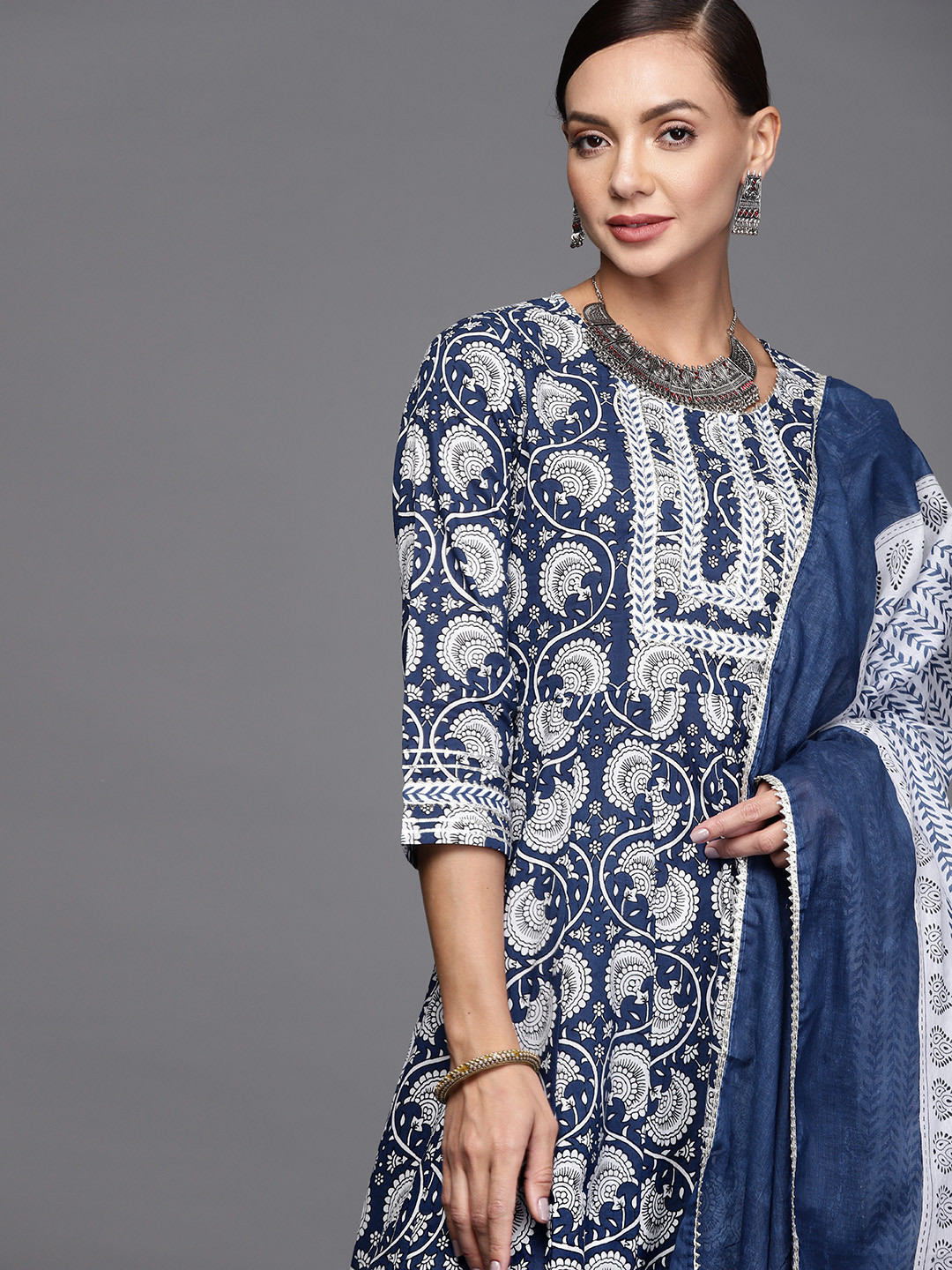

Indo Era Women Blue & White Ethnic Motifs Printed Gotta Patti Kurta with Trouser & Dupatta