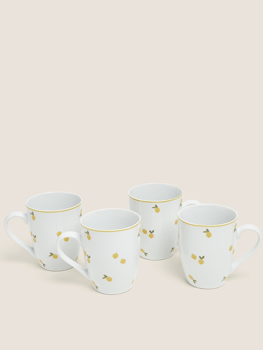 

Marks & Spencer Set Of 4 White & Yellow Printed Porcelain Glossy Mugs