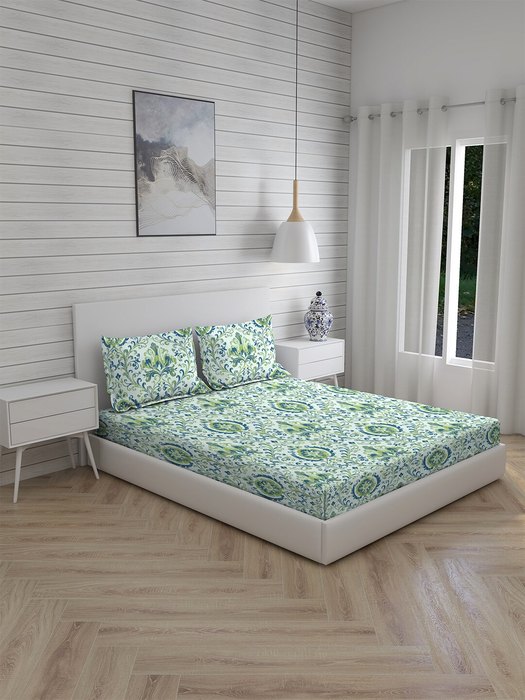 

Layers Blue & Green Ethnic Motifs 144 TC King Bedsheet with 2 Pillow Covers