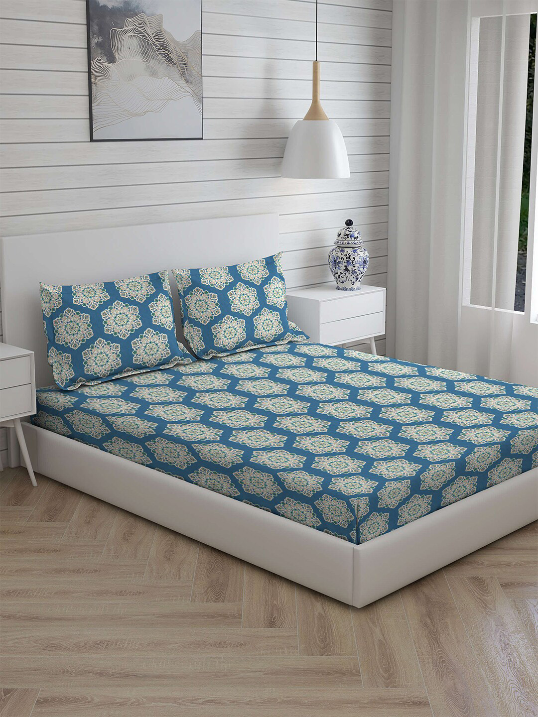 

Layers Blue & White Ethnic Motifs 144 TC King Bedsheet with 2 Pillow Covers