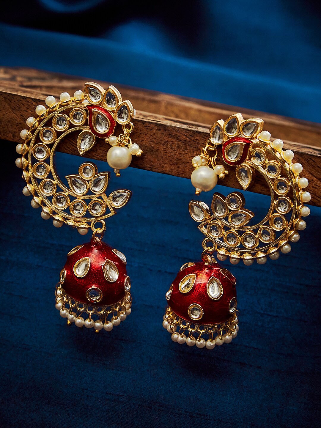 

SOHI Red & Gold-Toned Peacock Shaped Jhumkas Earrings