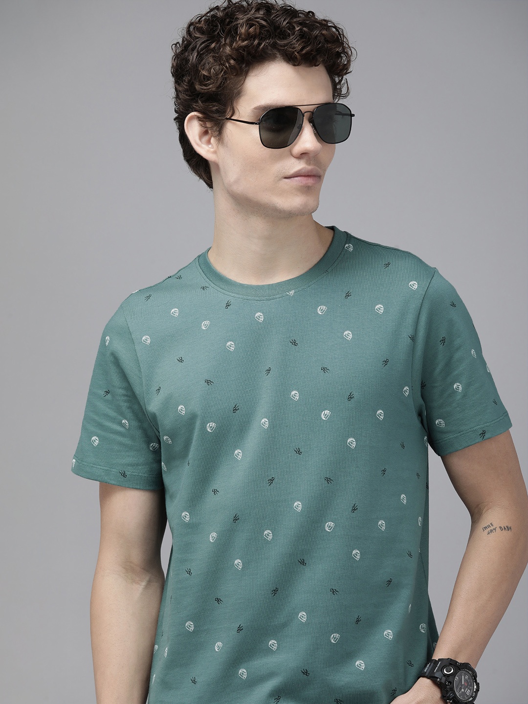 

The Roadster Lifestyle Co Men Green Printed Pure Cotton T-shirt