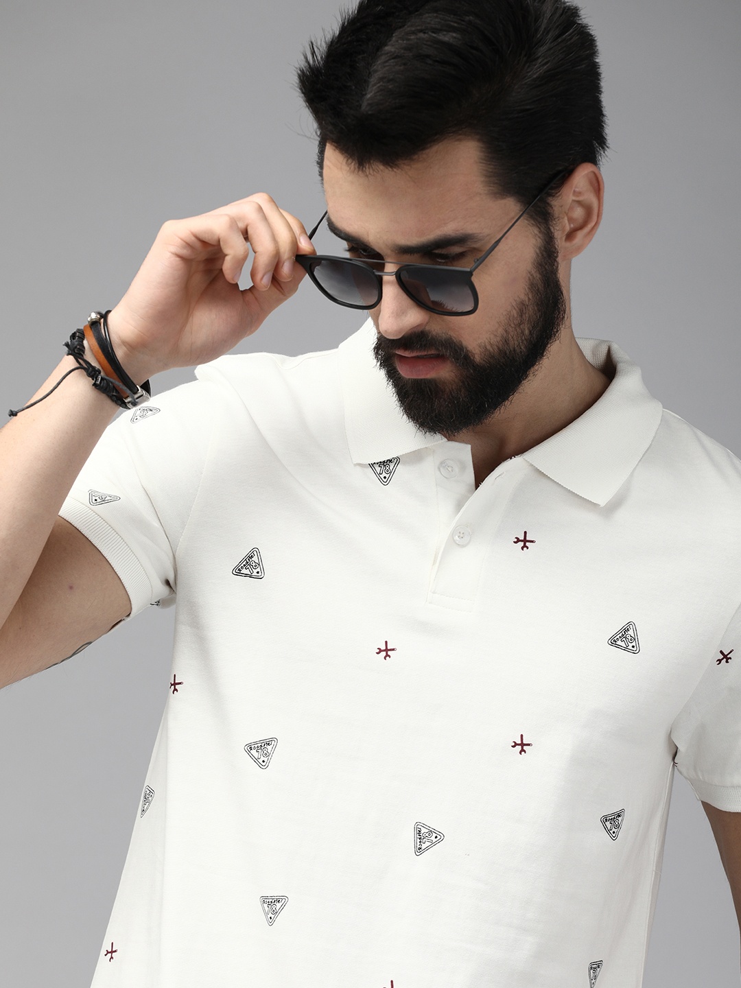 

The Roadster Lifestyle Co Men White Printed Pure Cotton Polo Collar T-shirt