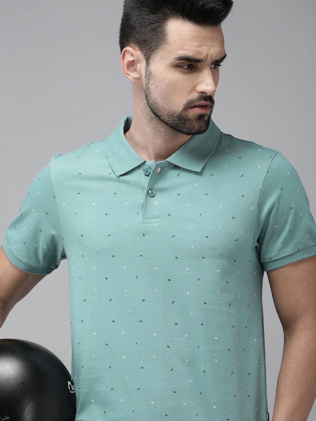 

The Roadster Lifestyle Co Men Sea Green Printed Pure Cotton Polo Collar T-shirt