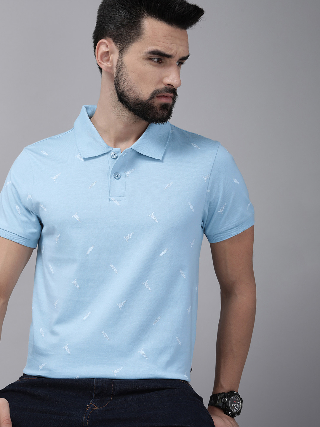 

The Roadster Lifestyle Co Men Light Blue & White Printed Polo Collar Pure Cotton T-shirt