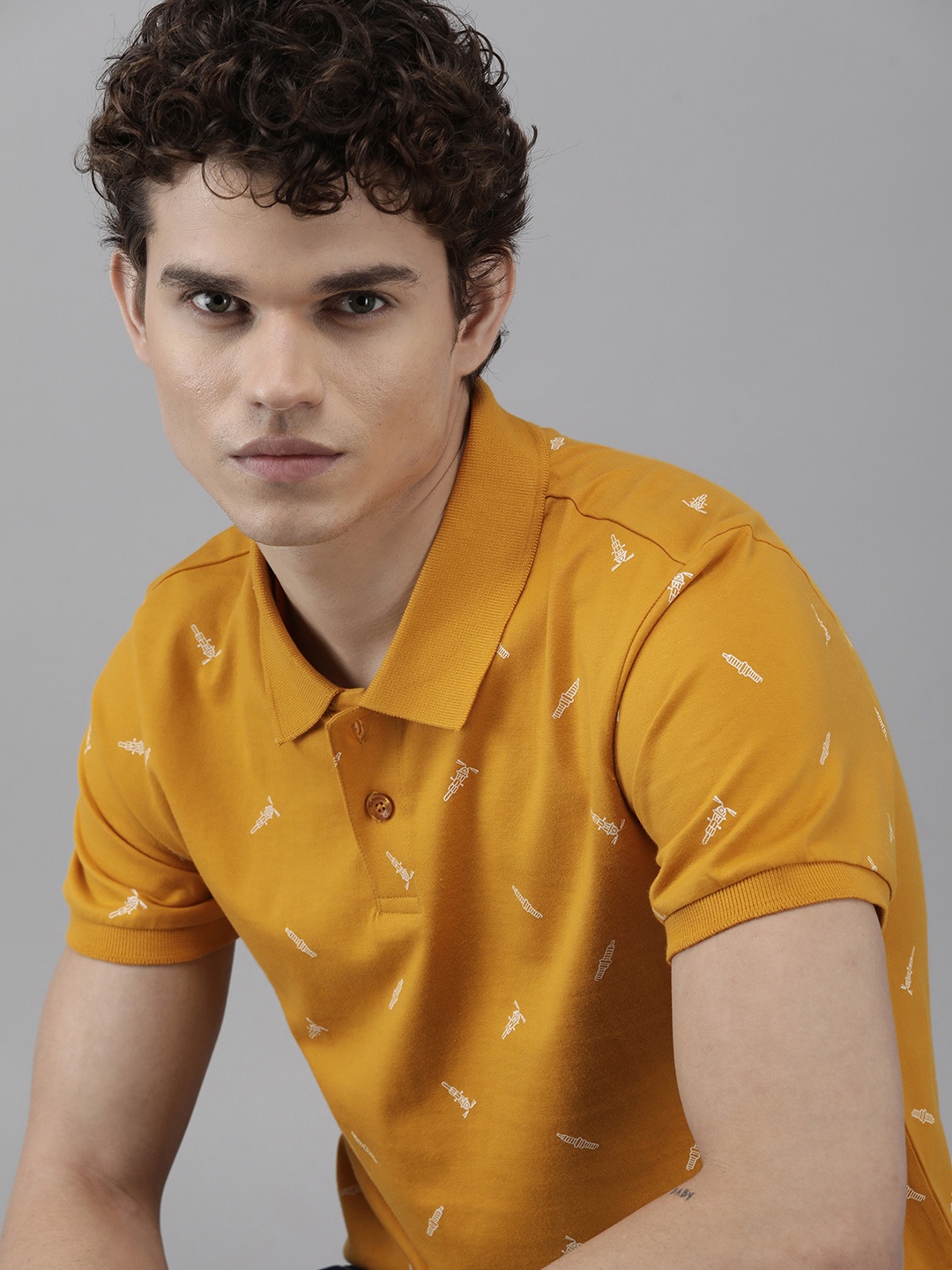 

Roadster Men Mustard Yellow & White Biker Printed Polo Collar Pure Cotton T-shirt