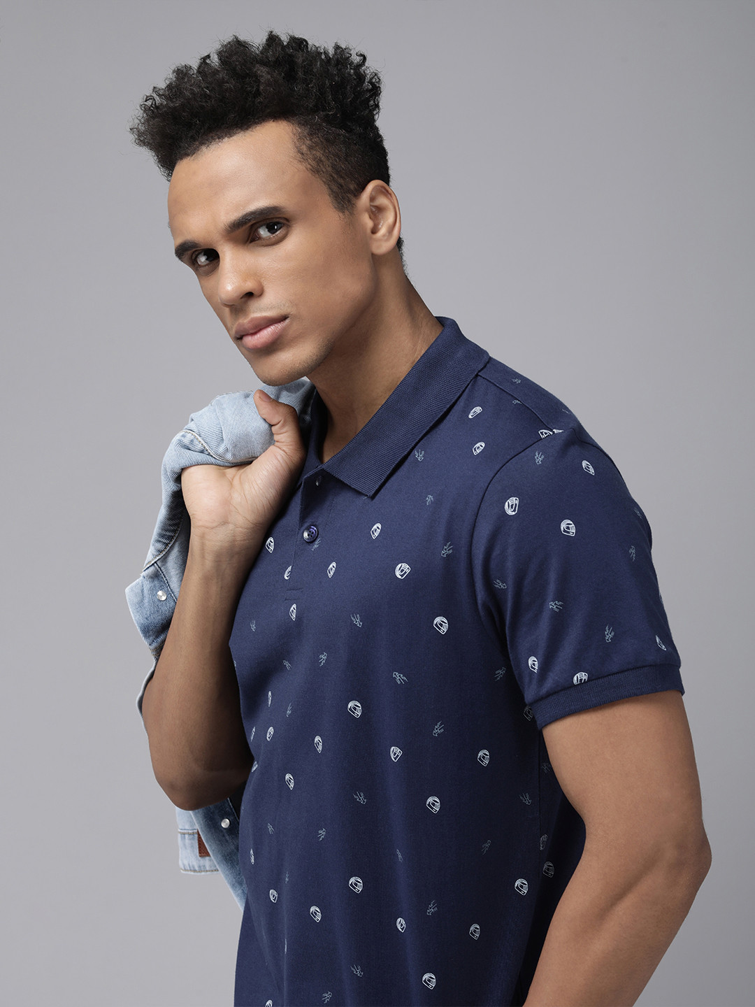 

The Roadster Lifestyle Co Men Navy Blue Printed Polo Collar Pure Cotton T-shirt