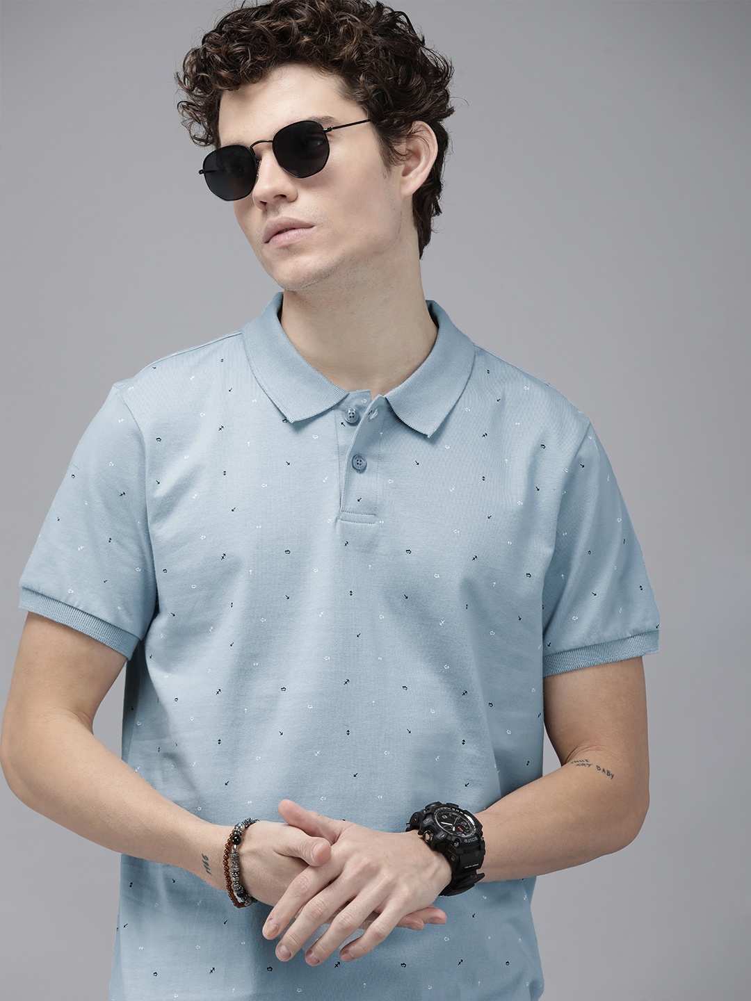 

Roadster Men Blue Geometric Printed Polo Collar Pure Cotton T-shirt