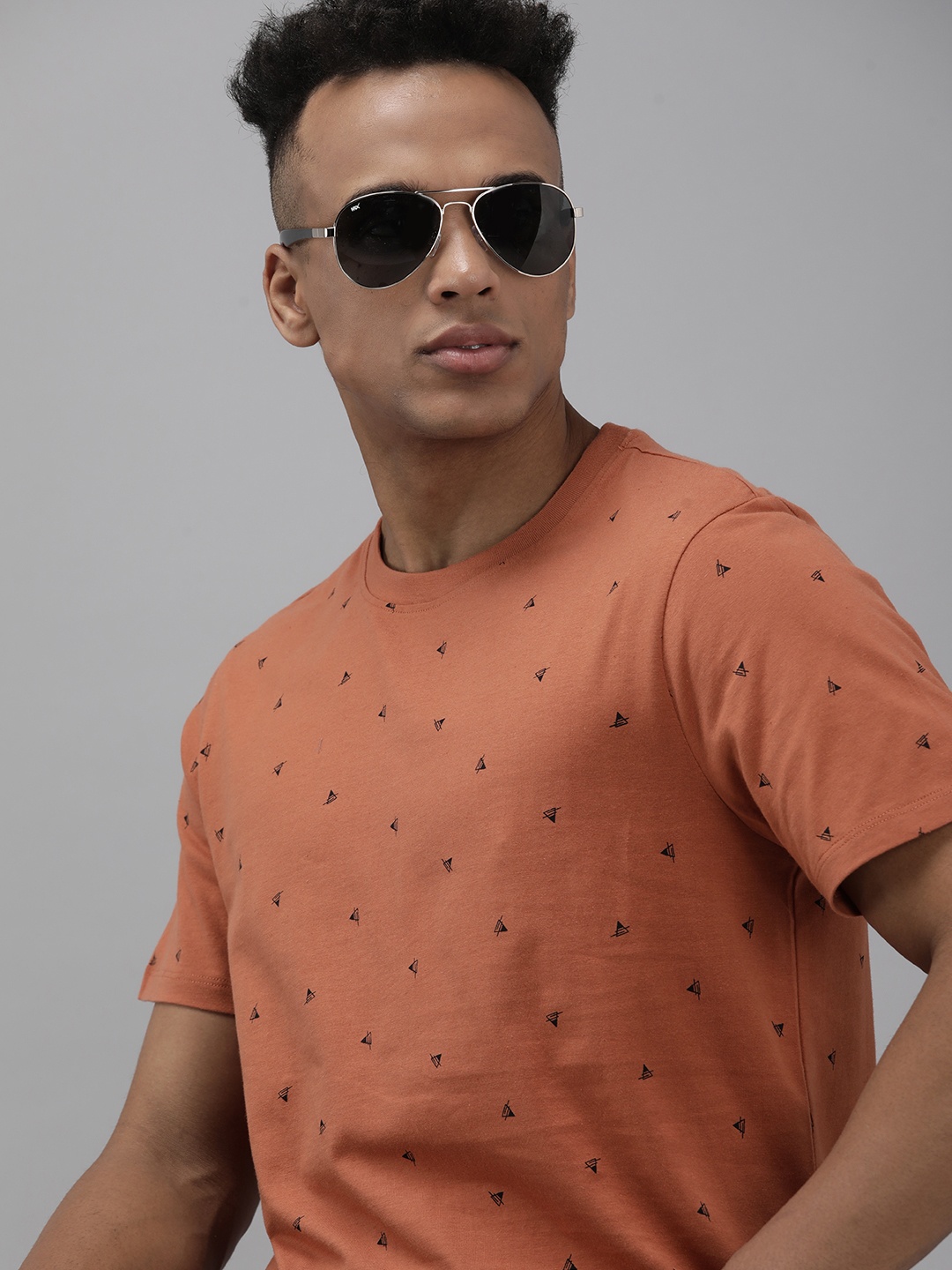 

The Roadster Lifestyle Co. Men Rust Printed Slim Fit Pure Cotton Casual T-shirt