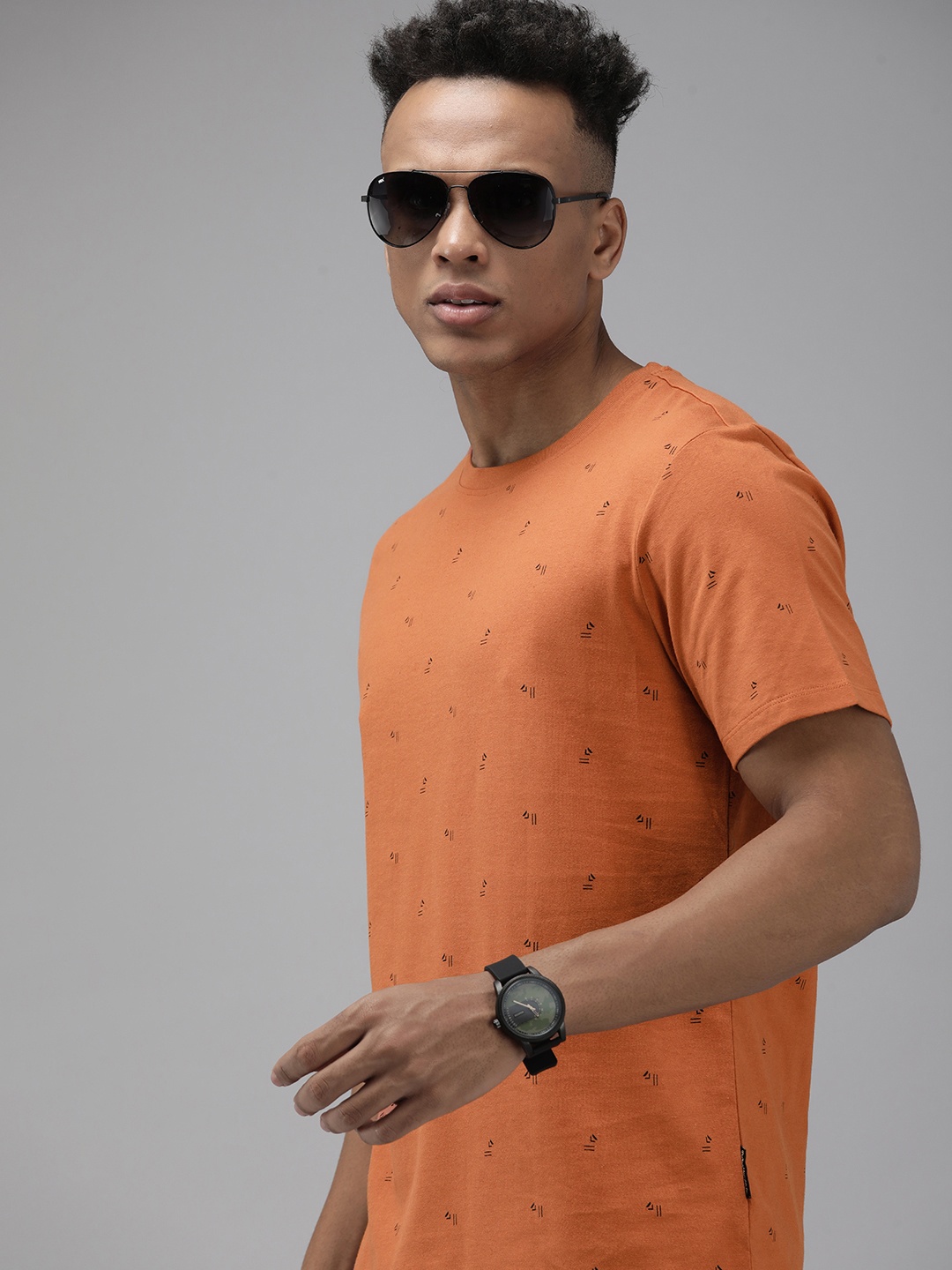 

The Roadster Lifestyle Co. Men Rust Printed Slim Fit Pure Cotton Casual T-shirt