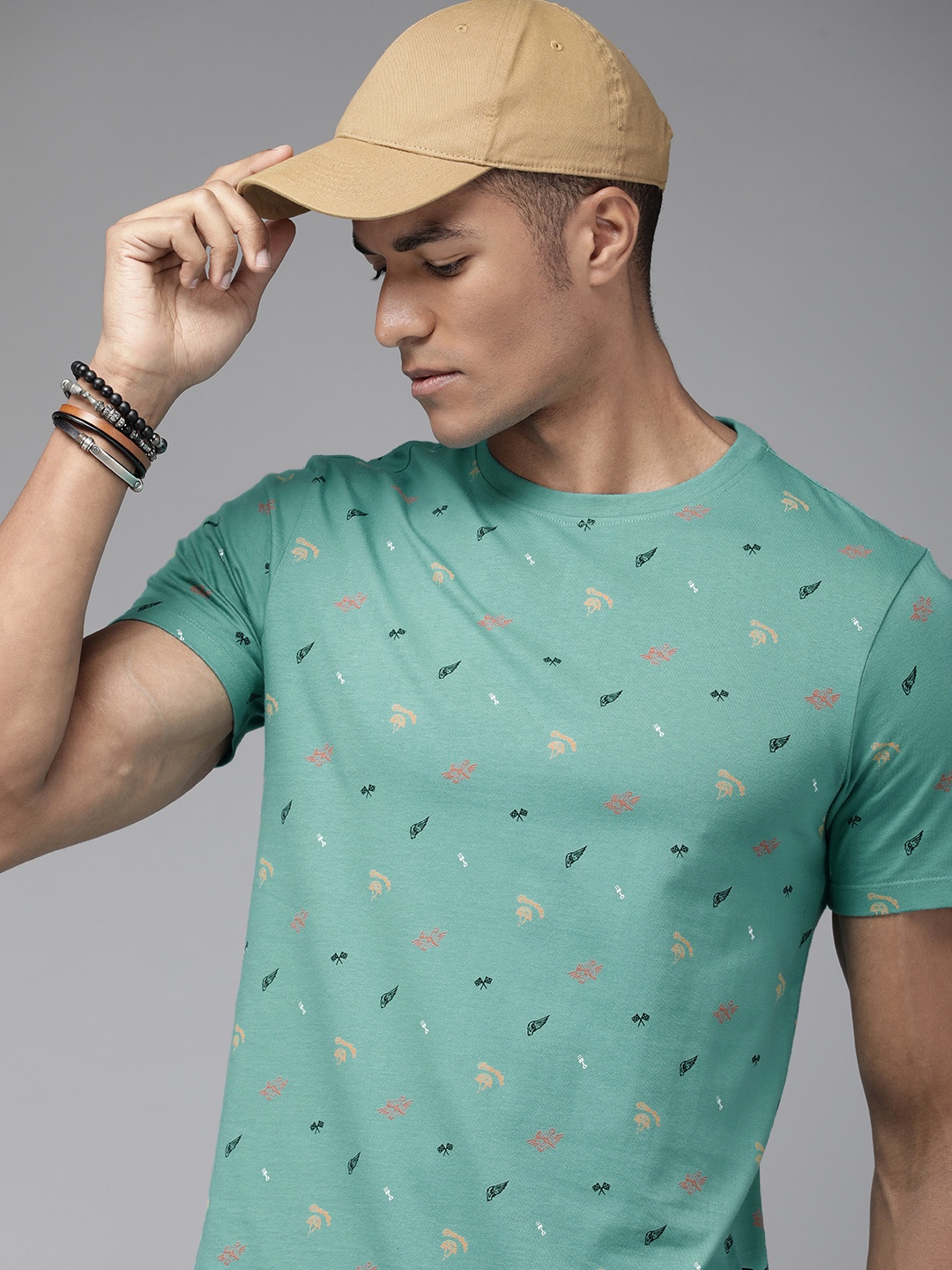 

The Roadster Lifestyle Co. Men Blue Printed Slim Fit Pure Cotton Casual T-shirt