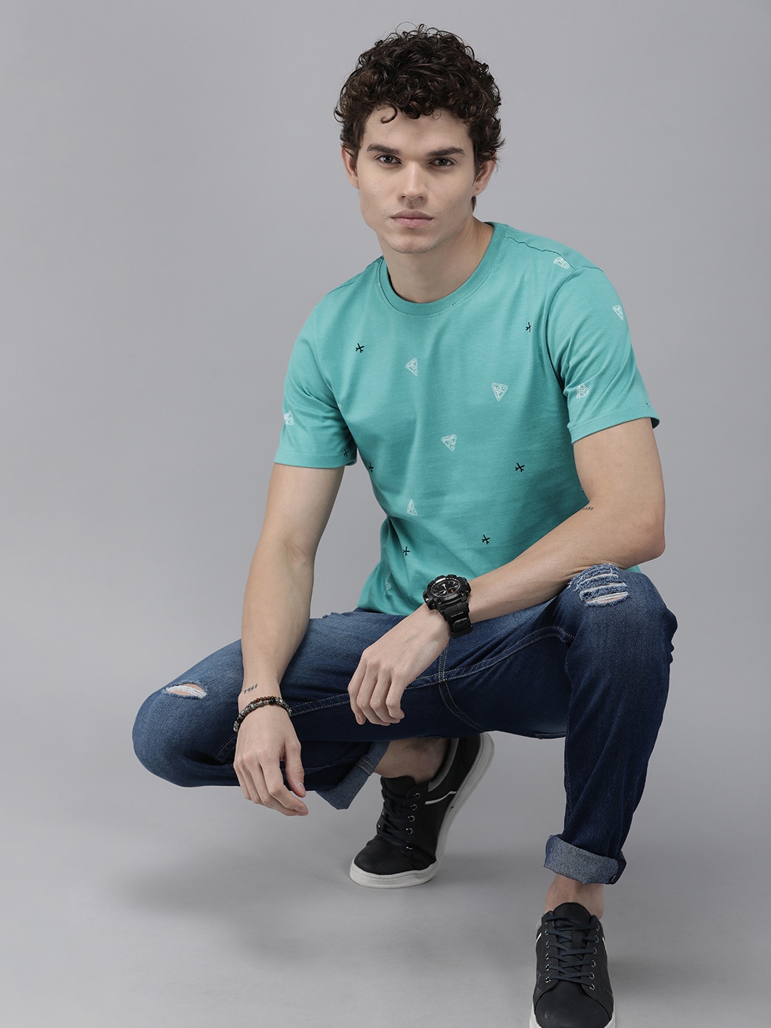 

The Roadster Lifestyle Co Men Green Printed Pure Cotton T-shirt