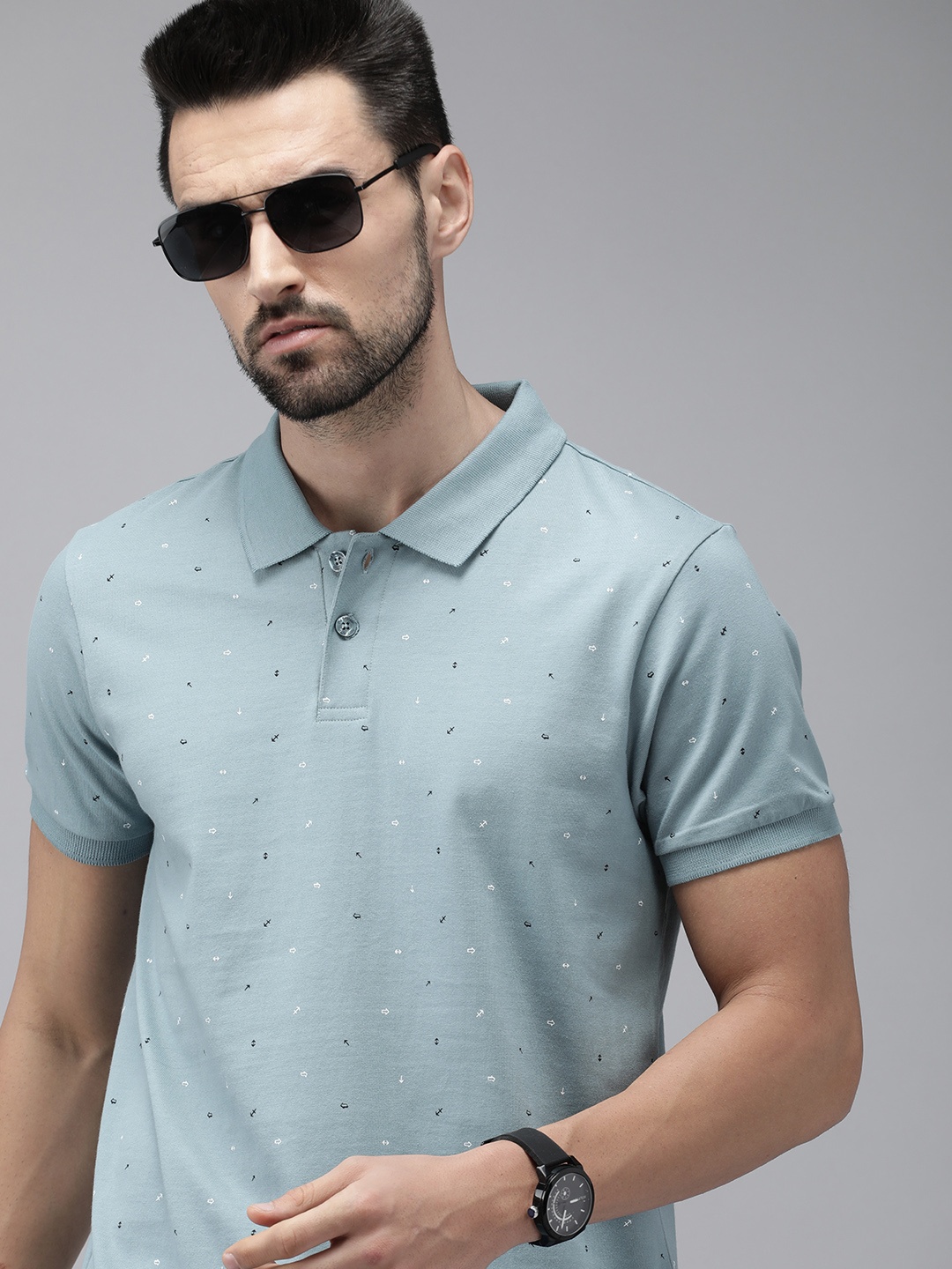 

The Roadster Lifestyle Co Men Blue Printed Polo Collar Pure Cotton T-shirt