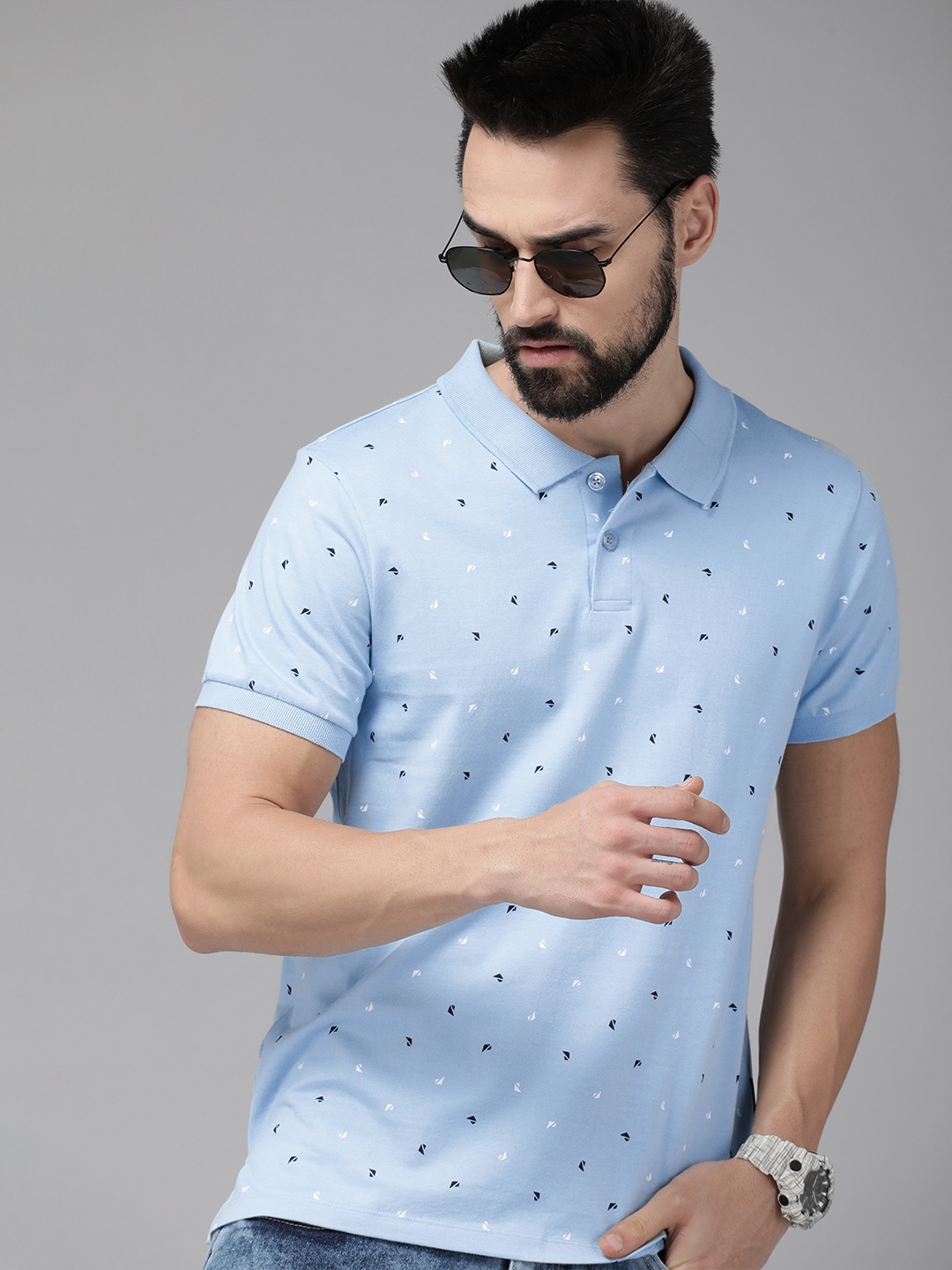 

Roadster Men Blue & White Printed Polo Collar T-shirt