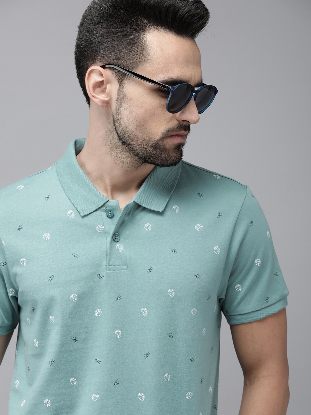 

The Roadster Lifestyle Co Men Blue & White Printed Polo Collar Pure Cotton T-shirt
