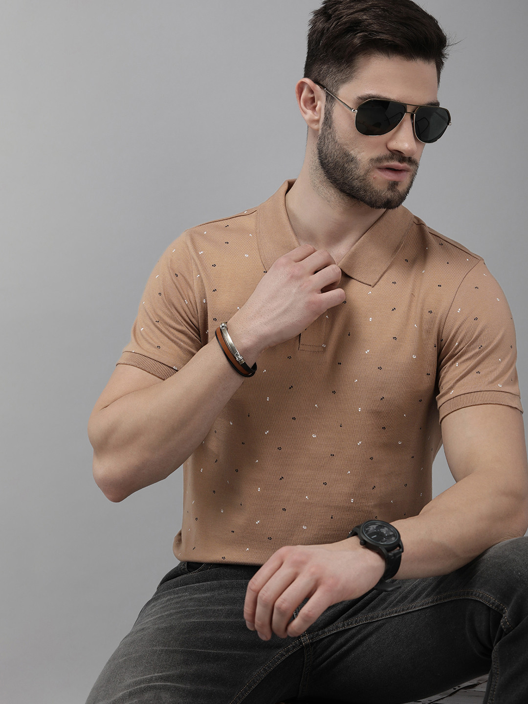

The Roadster Lifestyle Co. Men Brown & Black Printed Pure Cotton Polo Collar T-shirt