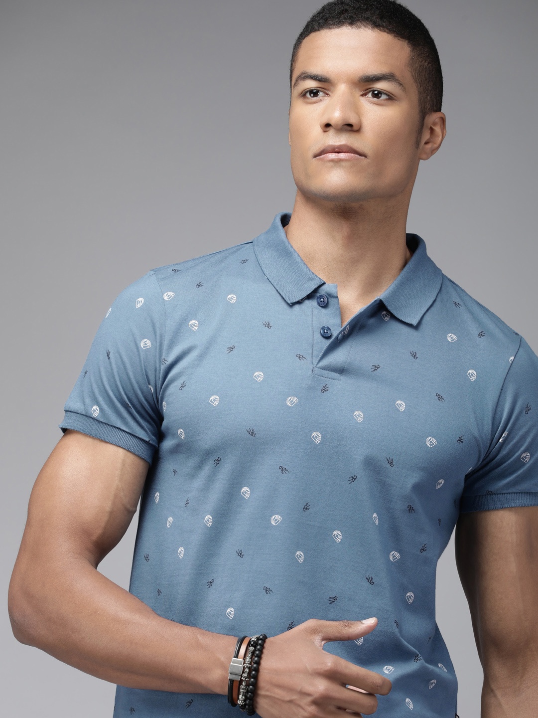

The Roadster Lifestyle Co Men Blue Printed Pure Cotton Polo Collar T-shirt