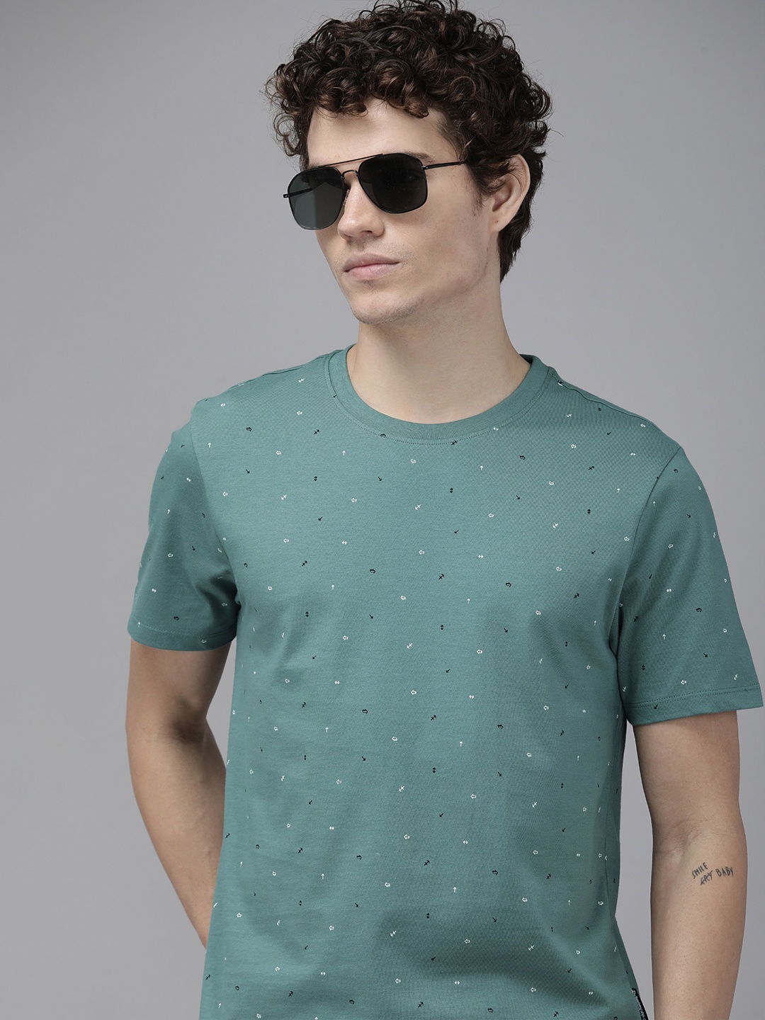 

The Roadster Lifestyle Co Men Green Printed Pure Cotton T-shirt