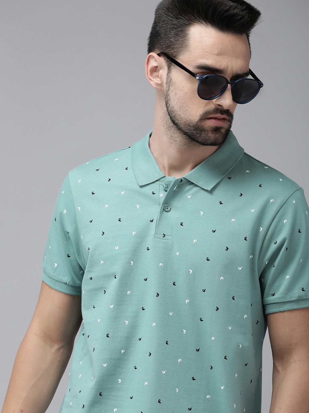 

The Roadster Lifestyle Co Men Sea Green Printed Pure Cotton Polo Collar T-shirt