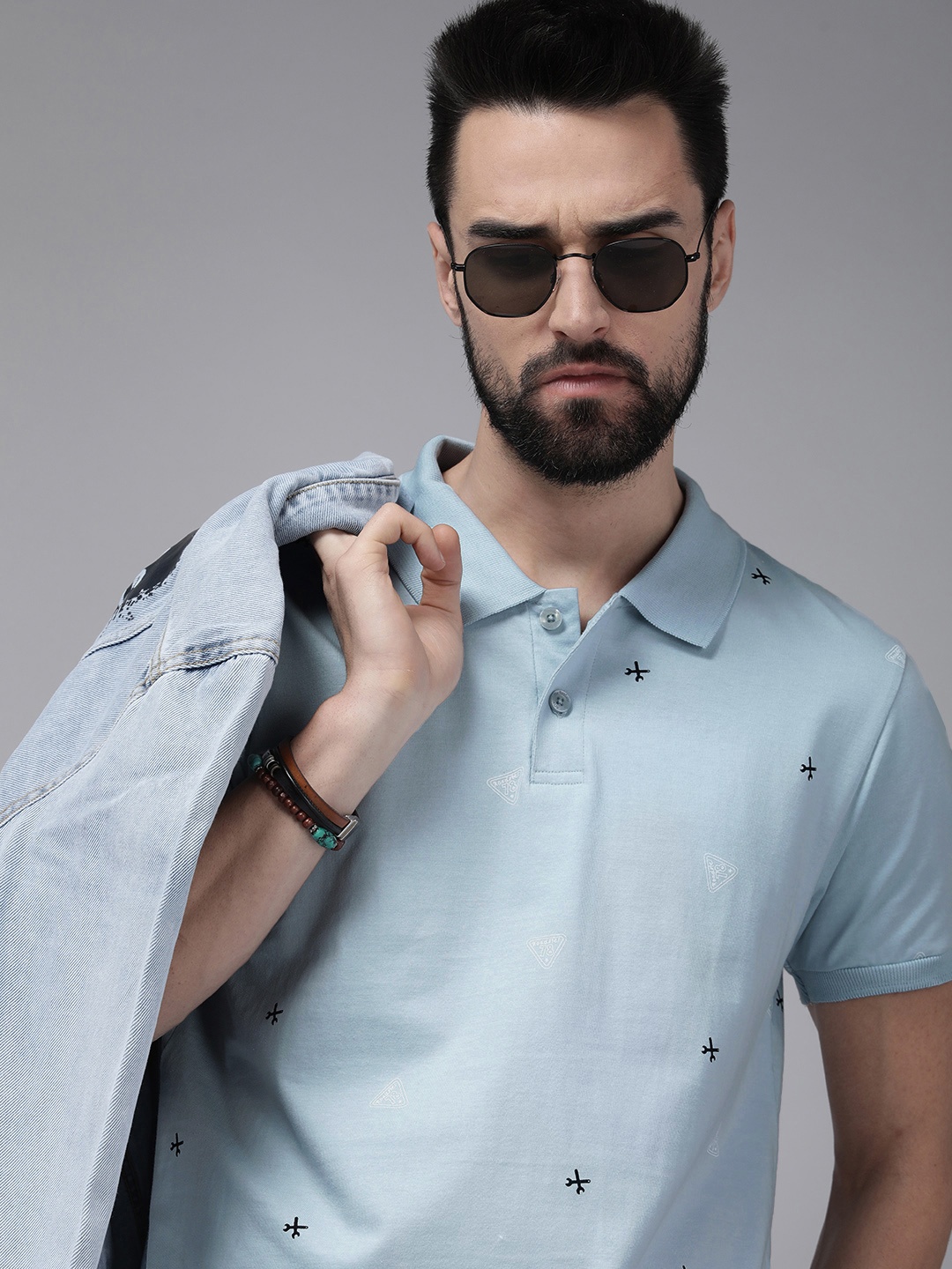 

The Roadster Lifestyle Co.Men Blue Printed Polo Collar Slim Fit Pure Cotton T-shirt
