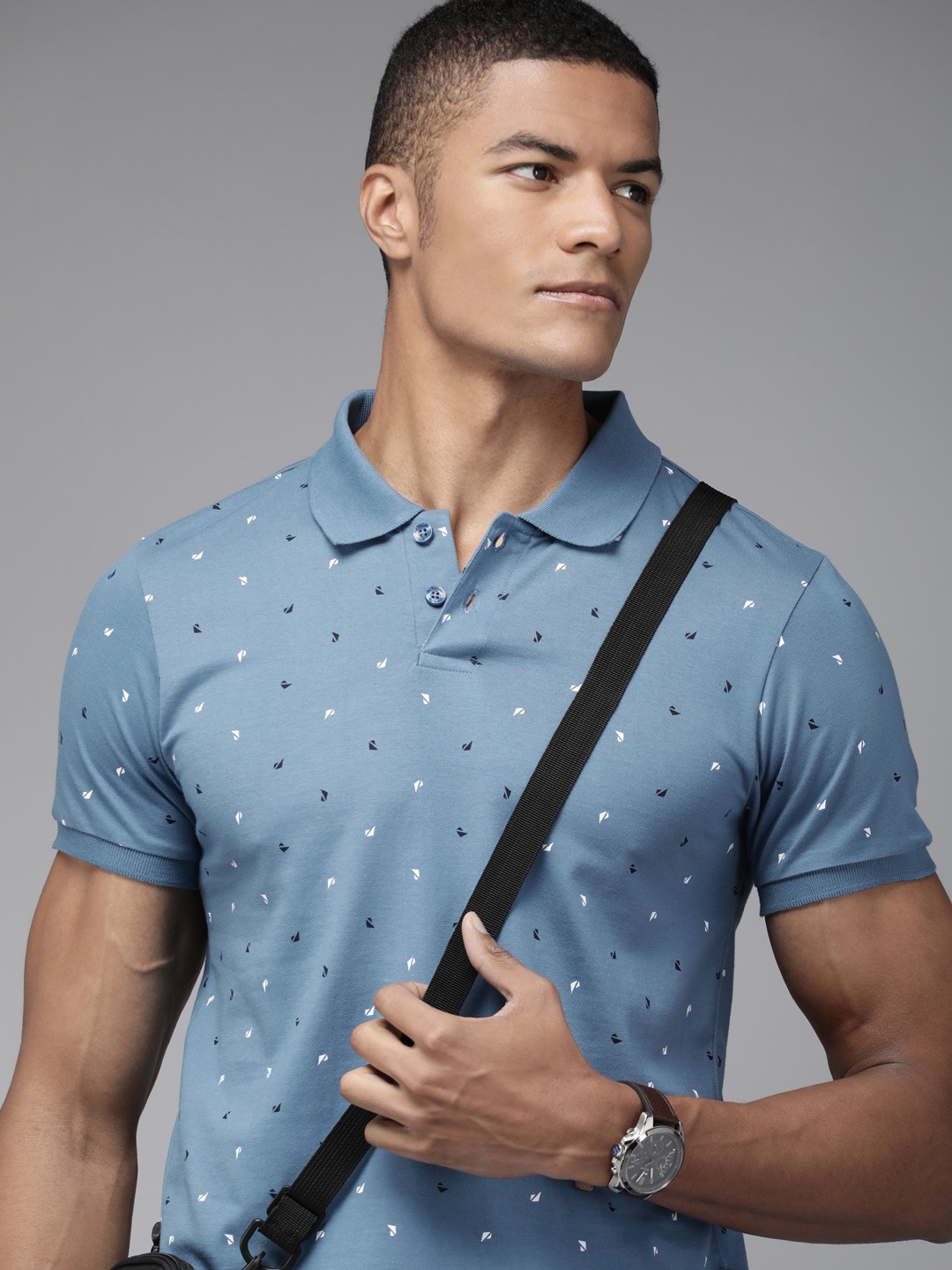 

The Roadster Lifestyle Co Men Blue & White Printed Pure Cotton Polo Collar T-shirt