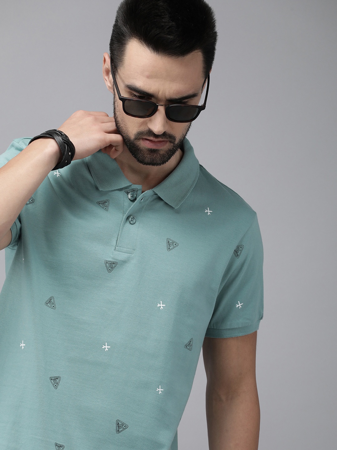 

The Roadster Lifestyle Co Men Sea Green Printed Pure Cotton Polo Collar T-shirt